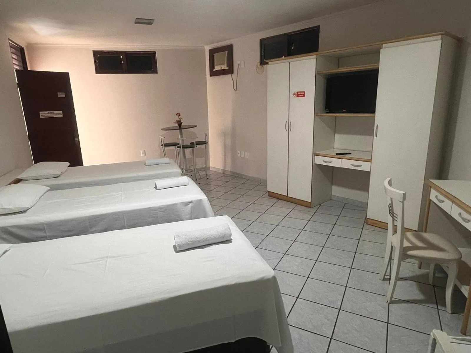 Bed in Center Plaza Hotel