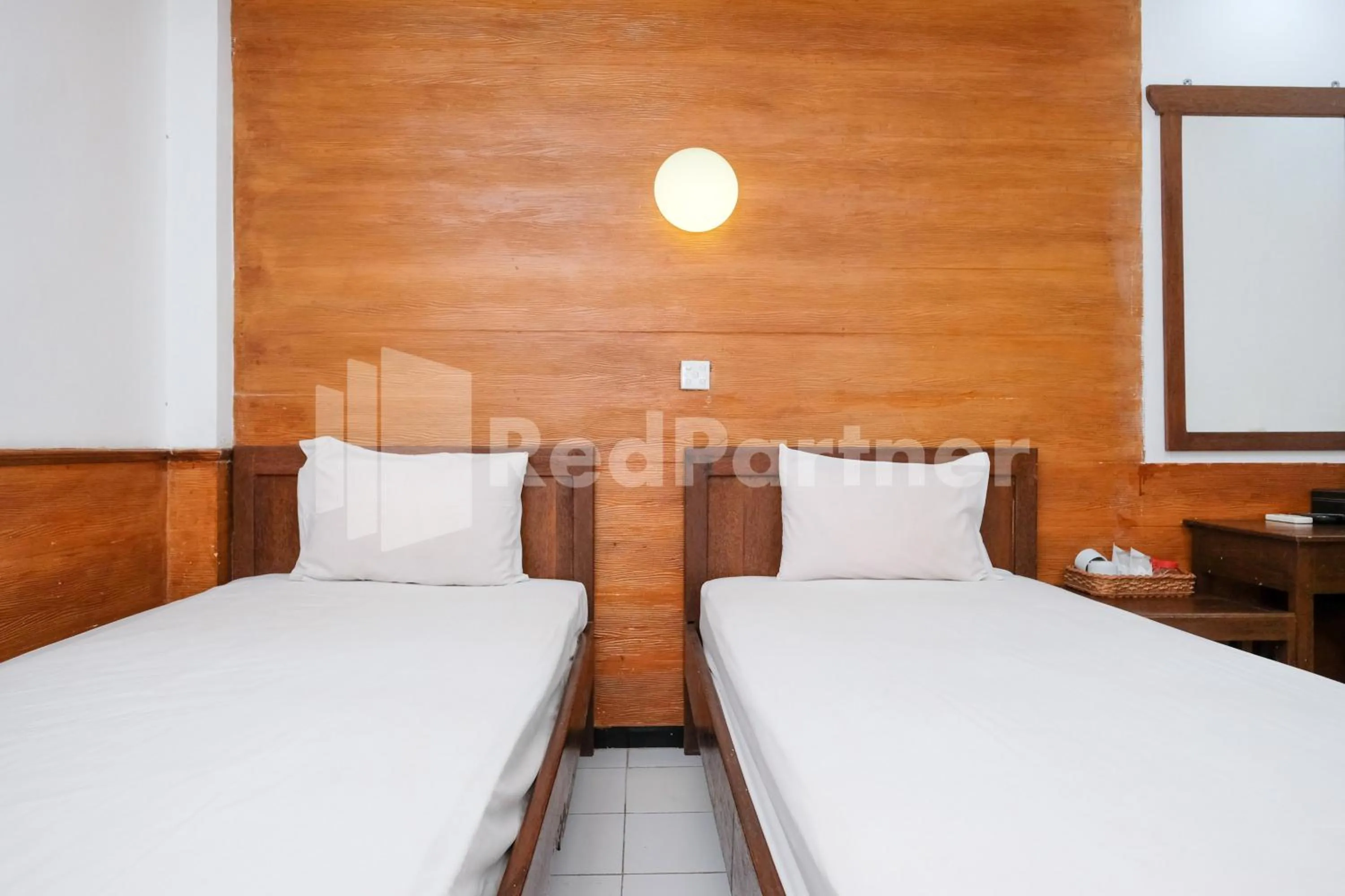 Bedroom, Bed in The Soemarsono Hotel near Ambarrukmo Plaza Mall RedPartner