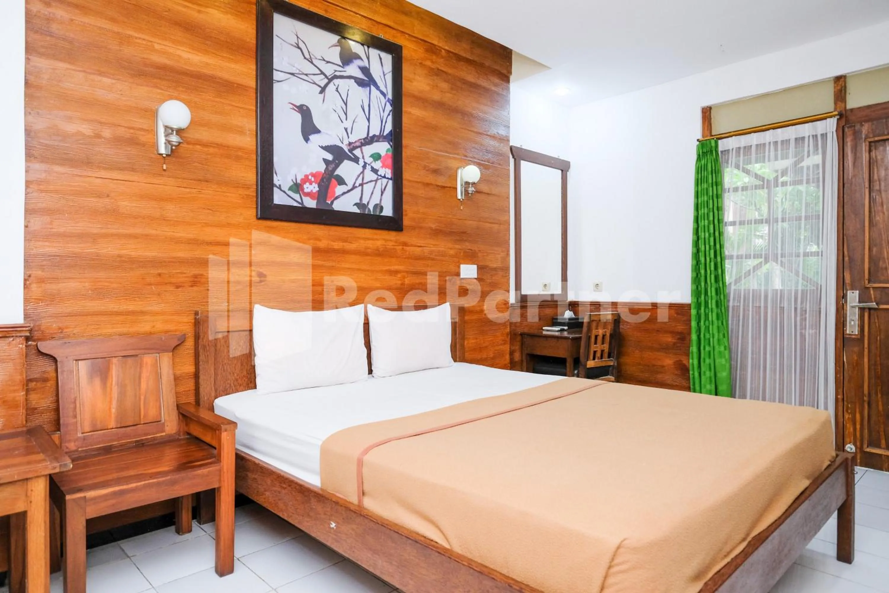 Bedroom, Bed in The Soemarsono Hotel near Ambarrukmo Plaza Mall RedPartner