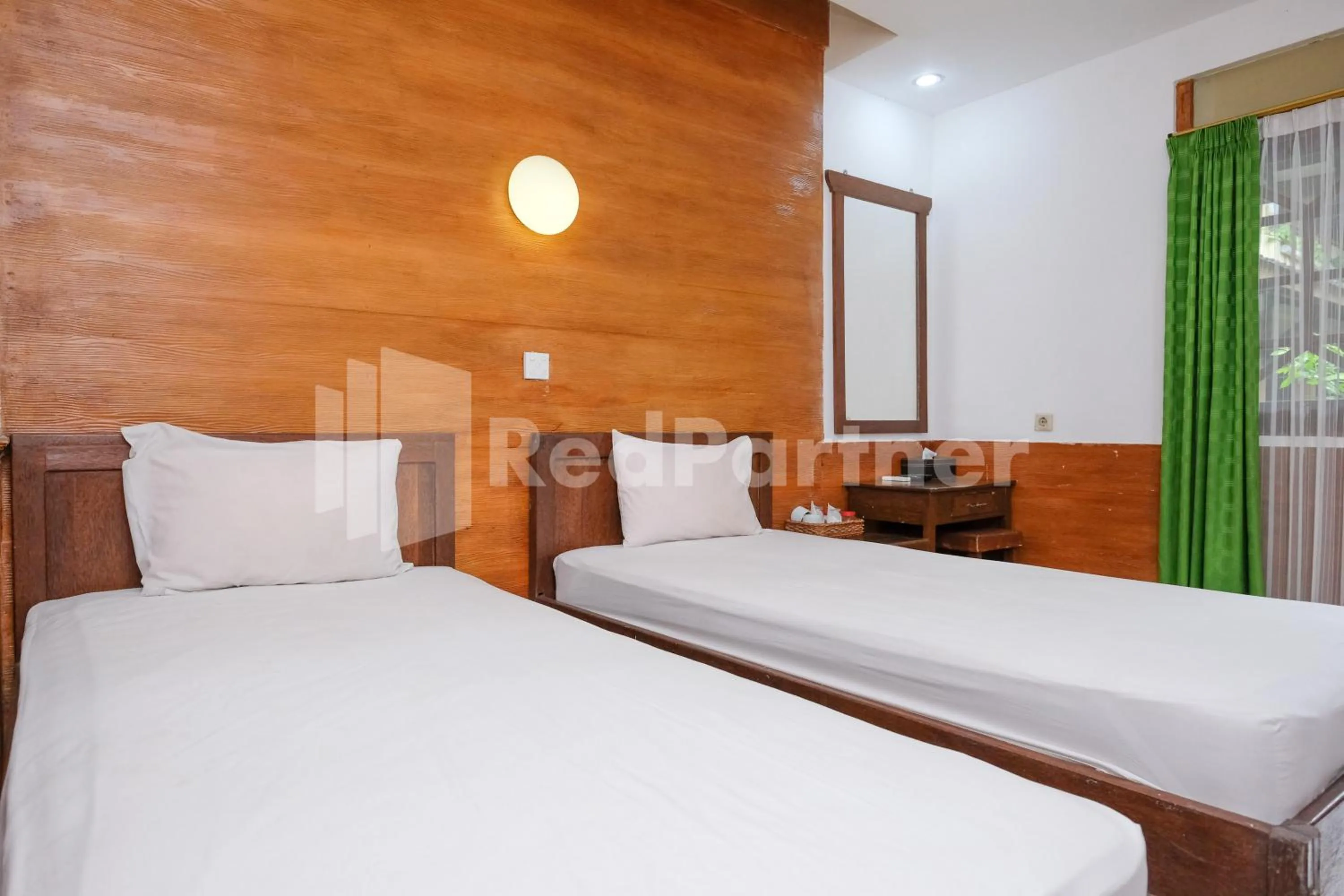 Bedroom, Bed in The Soemarsono Hotel near Ambarrukmo Plaza Mall RedPartner