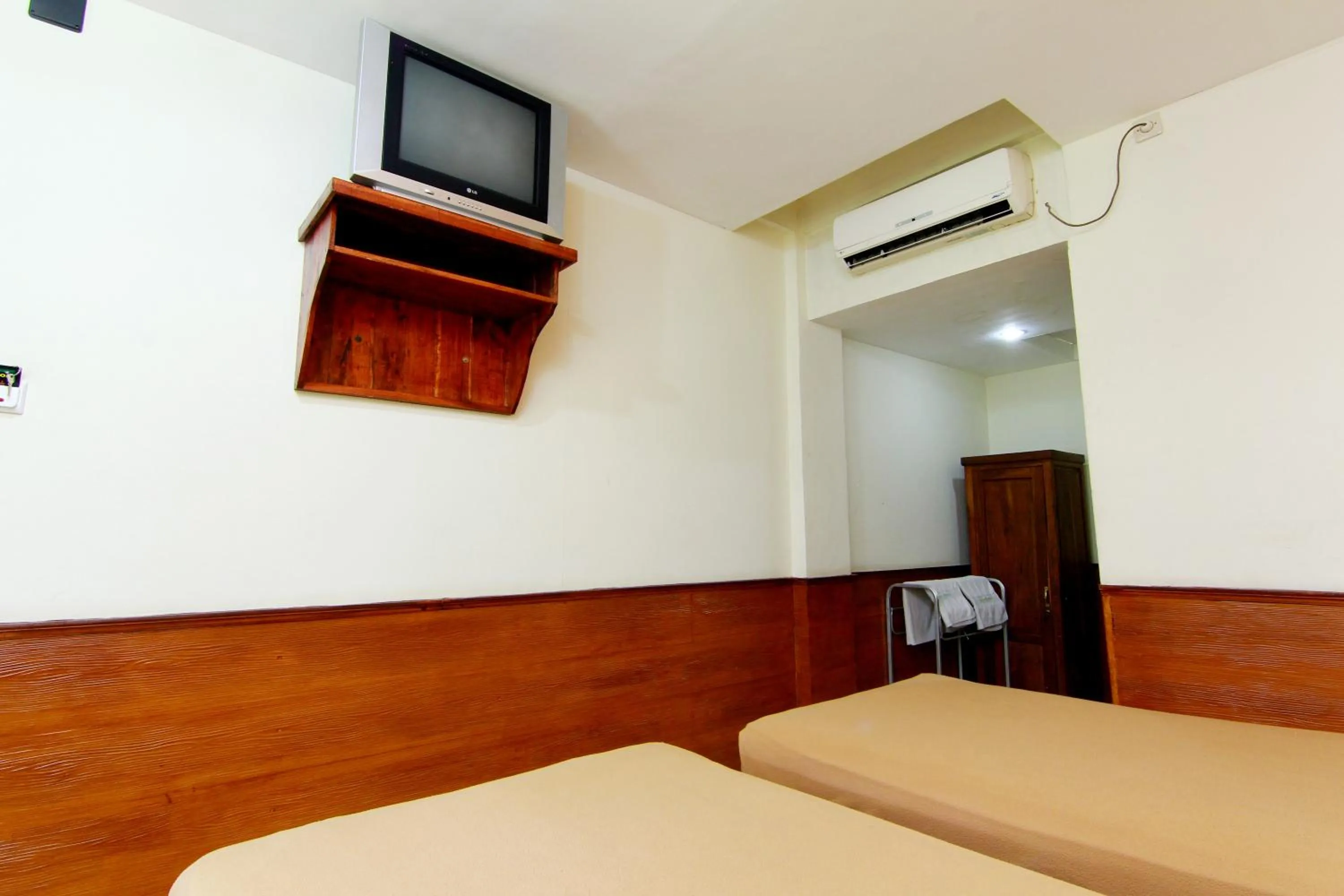 Bed in The Soemarsono Hotel