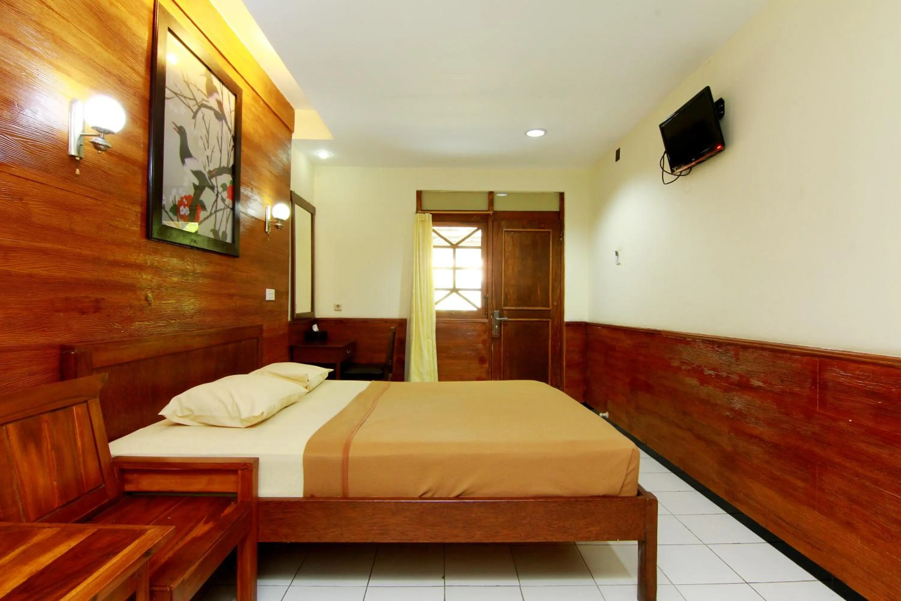 Bed in The Soemarsono Hotel