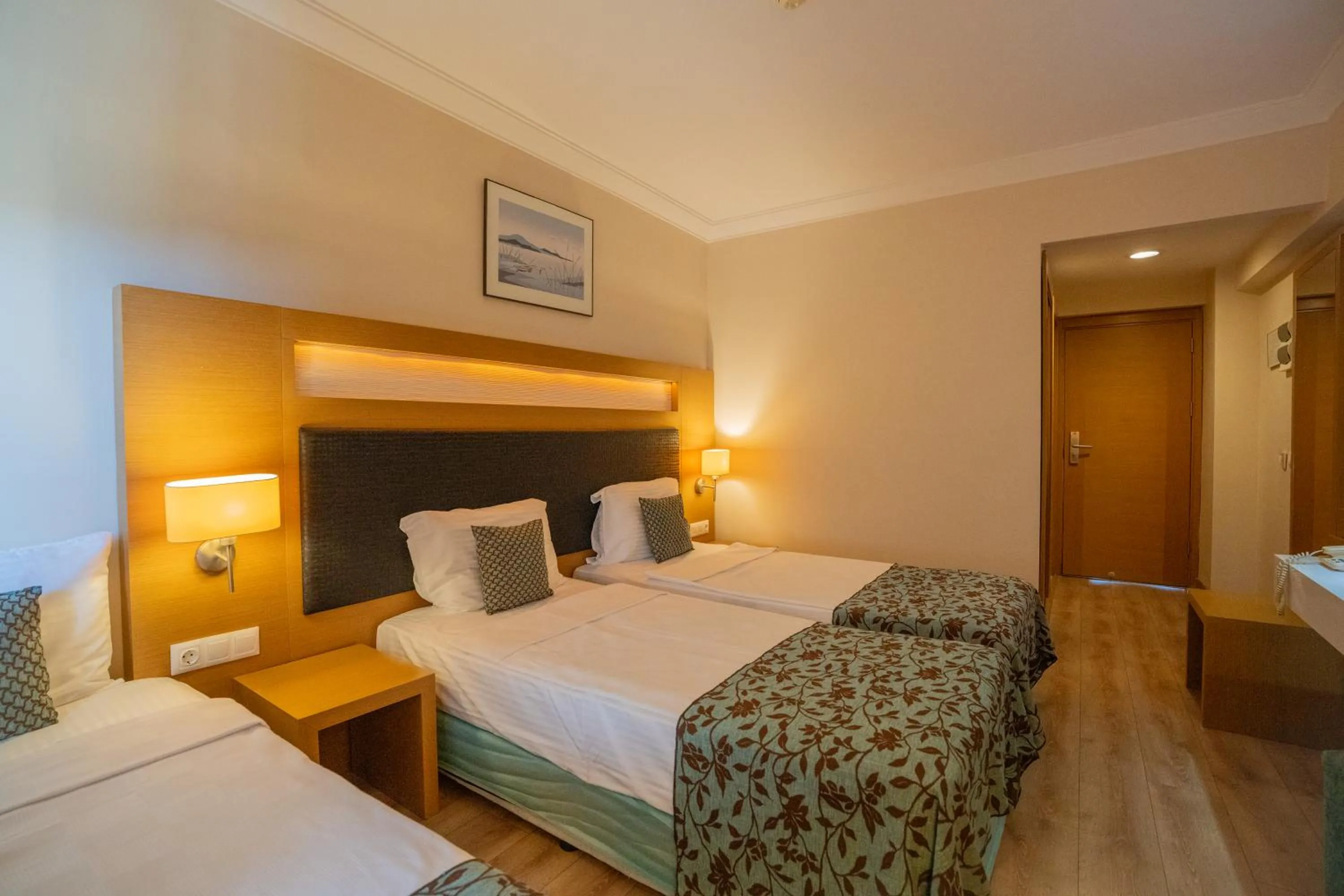 Bed in Marbel Hotel by PalmWings