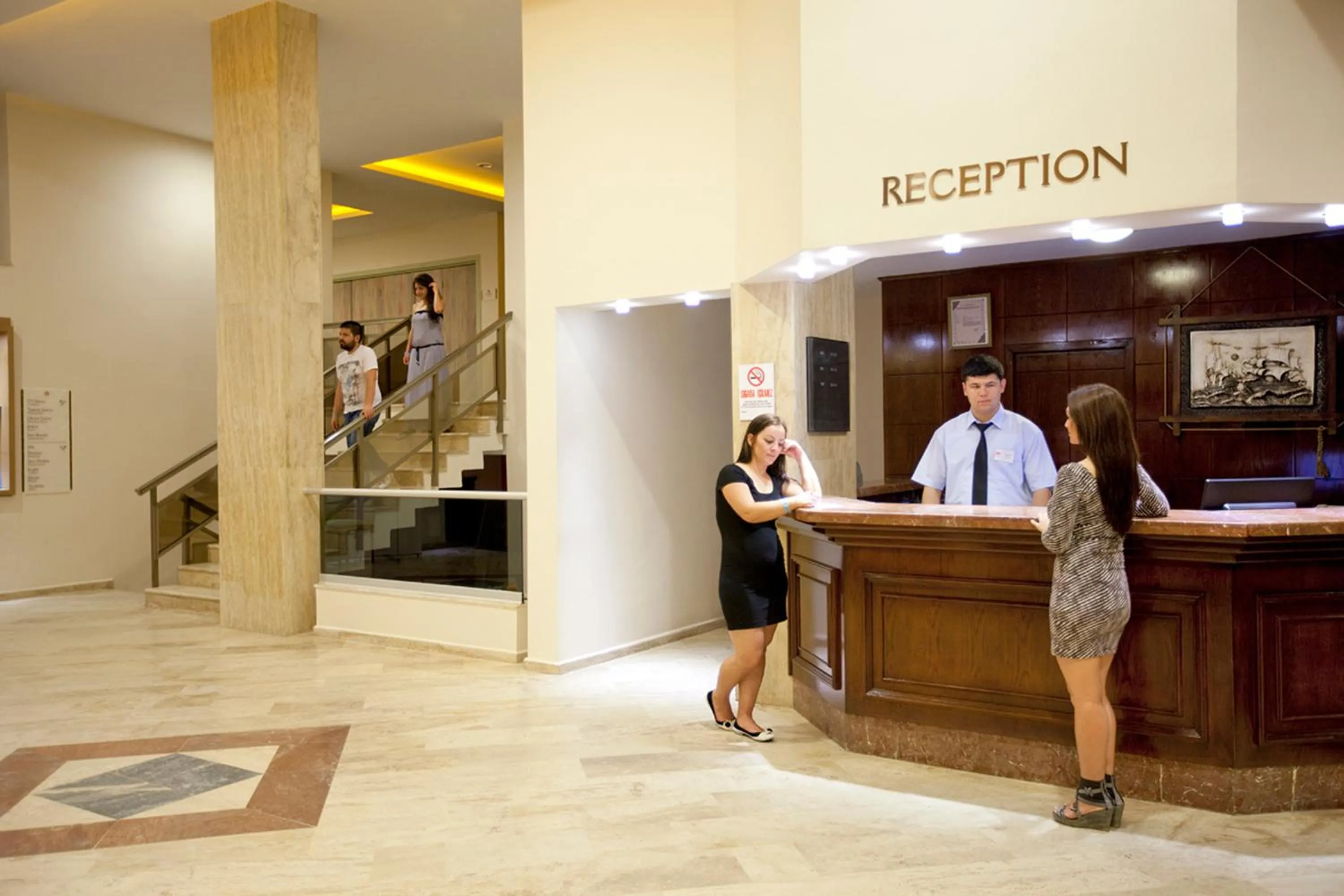 Staff in Marbel Hotel by PalmWings