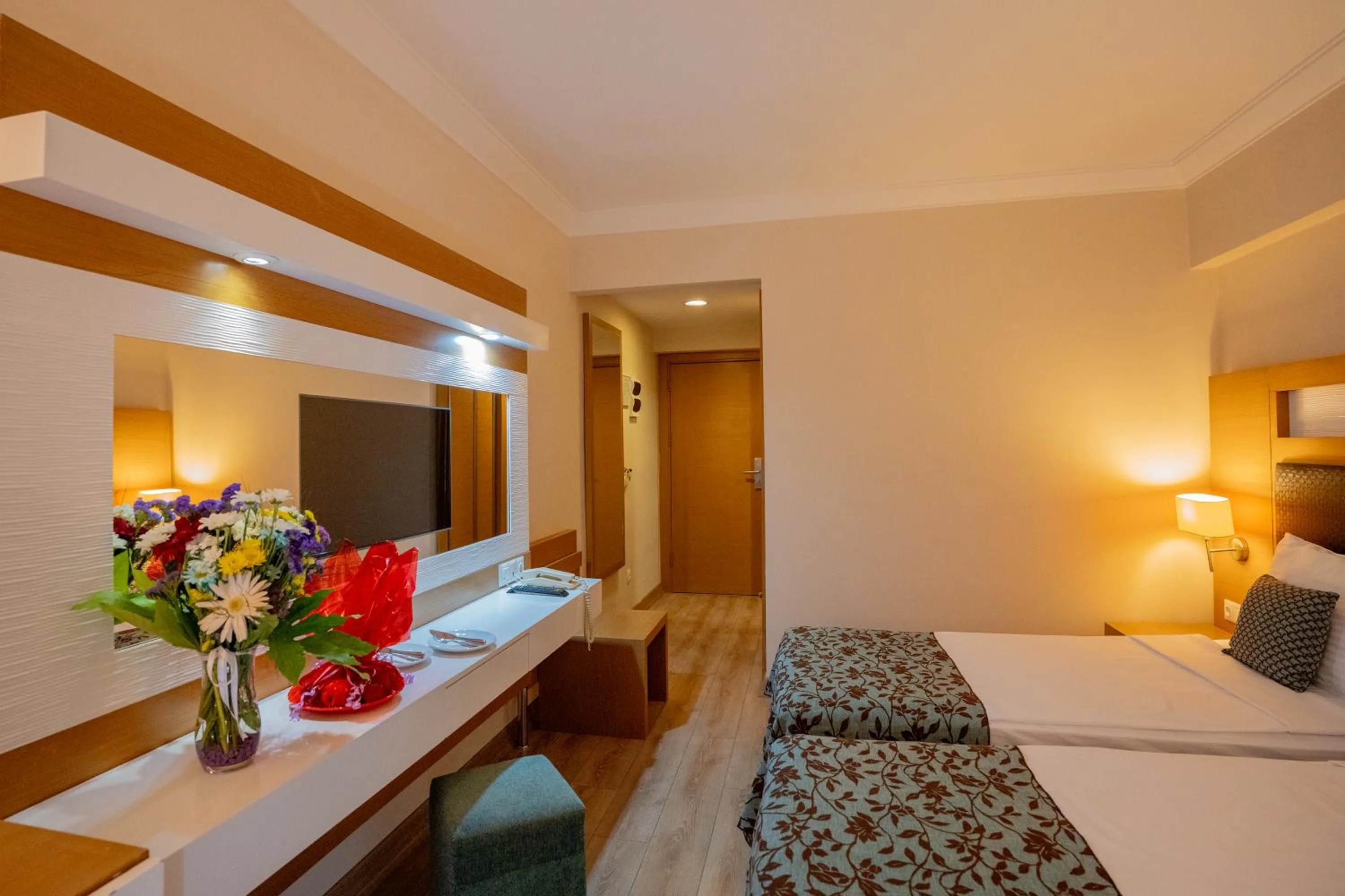 Bed in Marbel Hotel by PalmWings