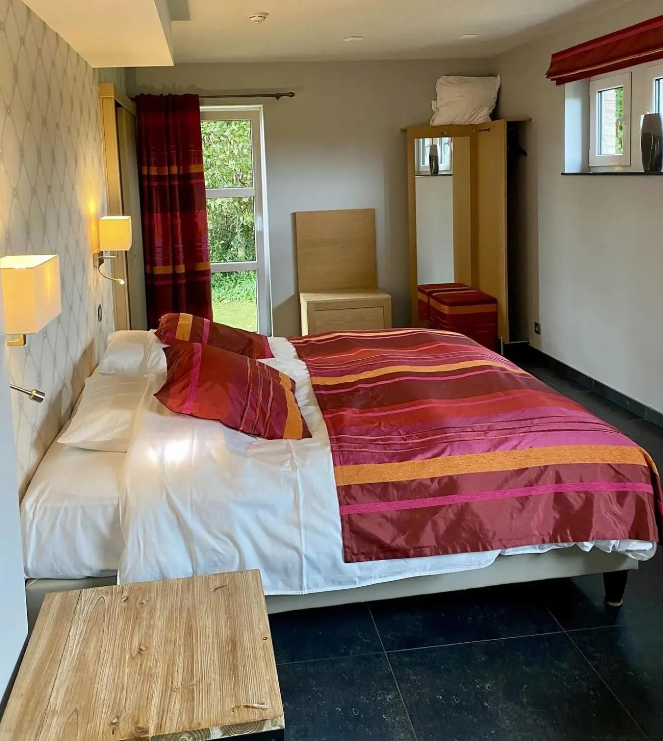 Bed in Hotel L'Ami du Chambertin