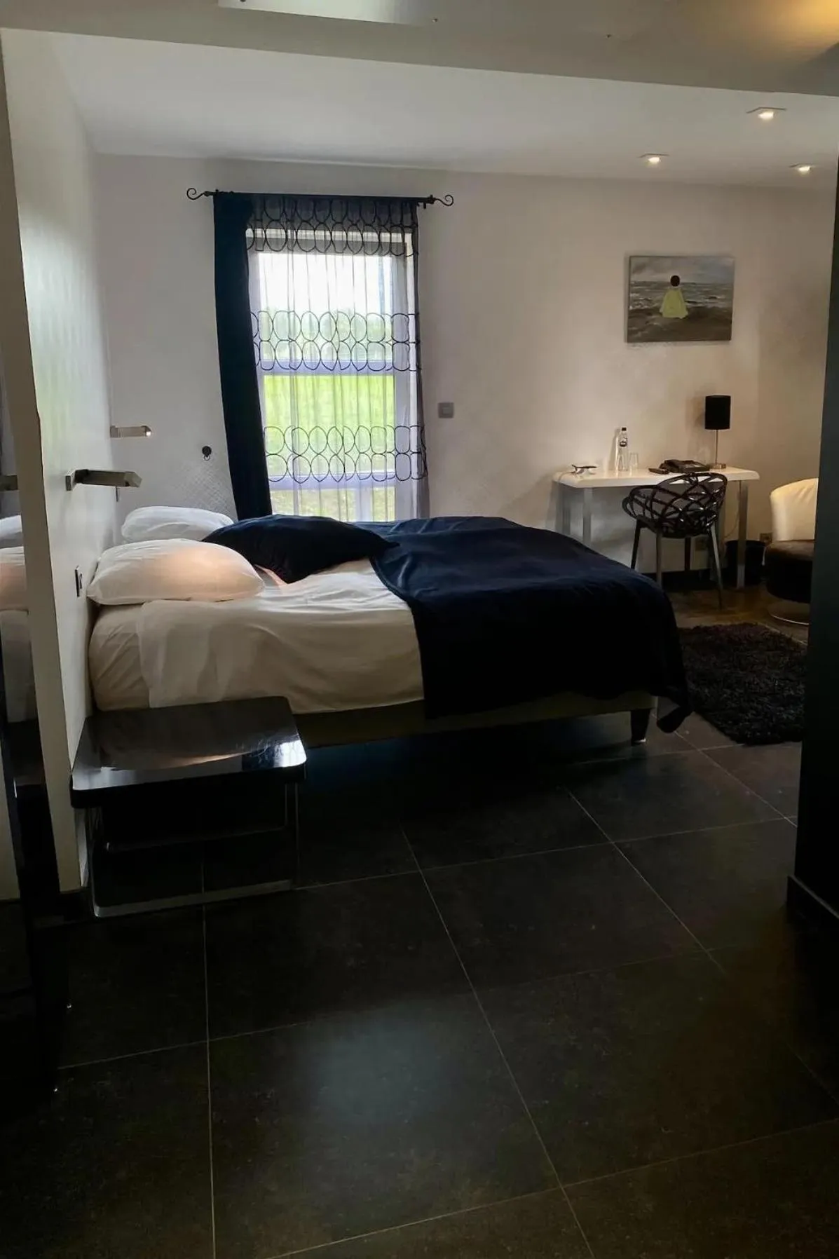 Bed in Hotel L'Ami du Chambertin