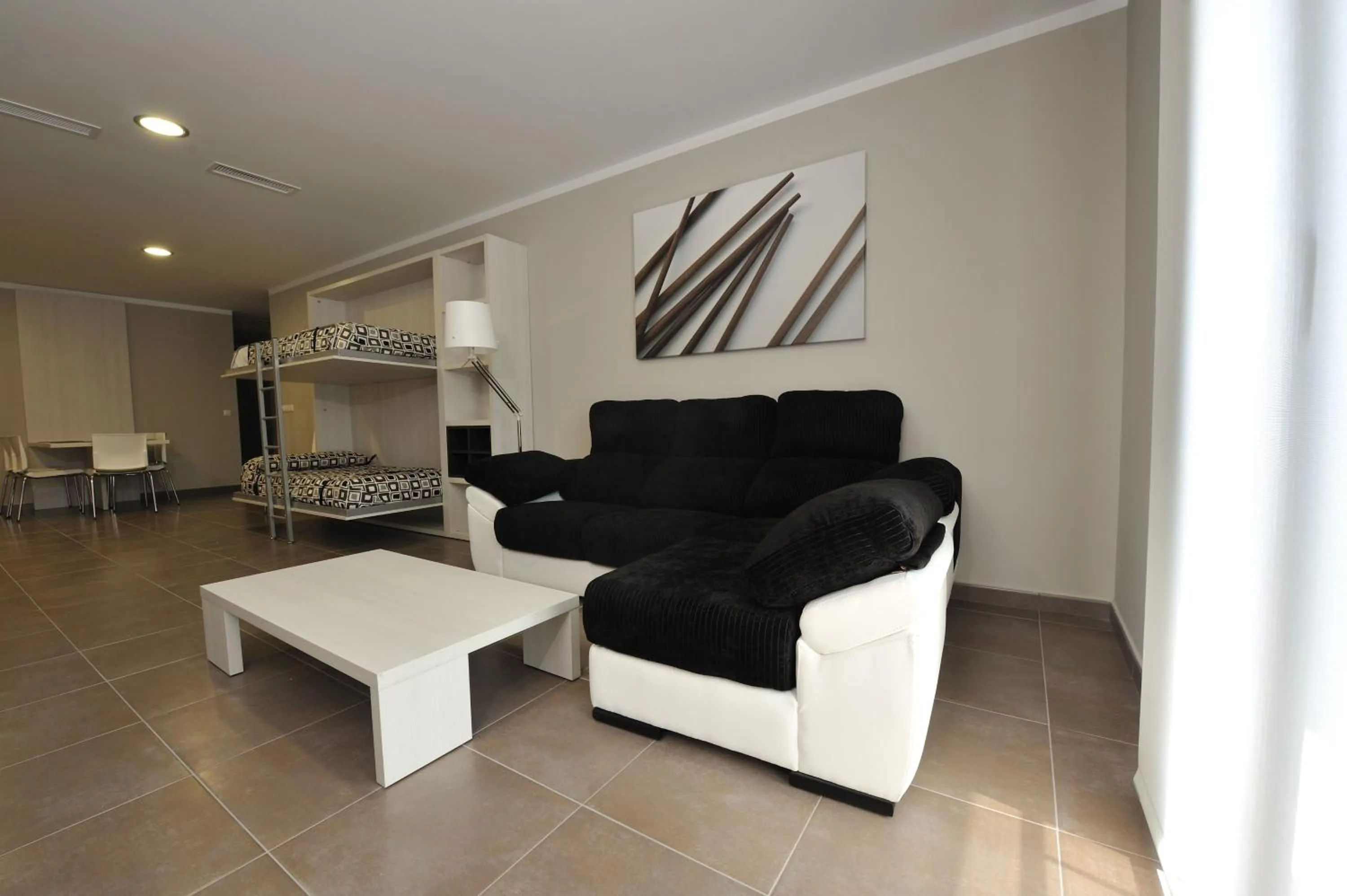 bunk bed in Aparthotel Meseguer