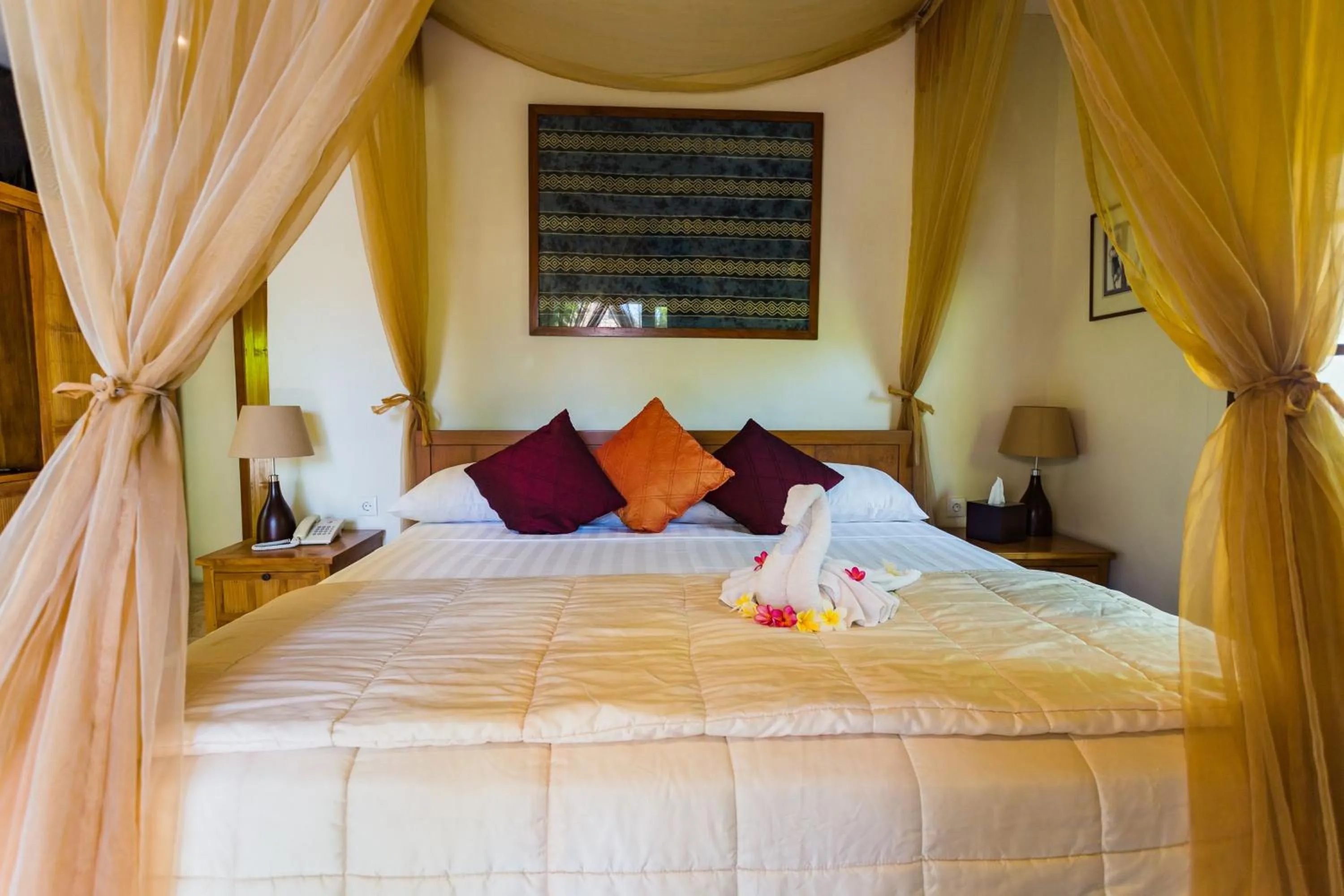 Bed in The Water Garden Hotel