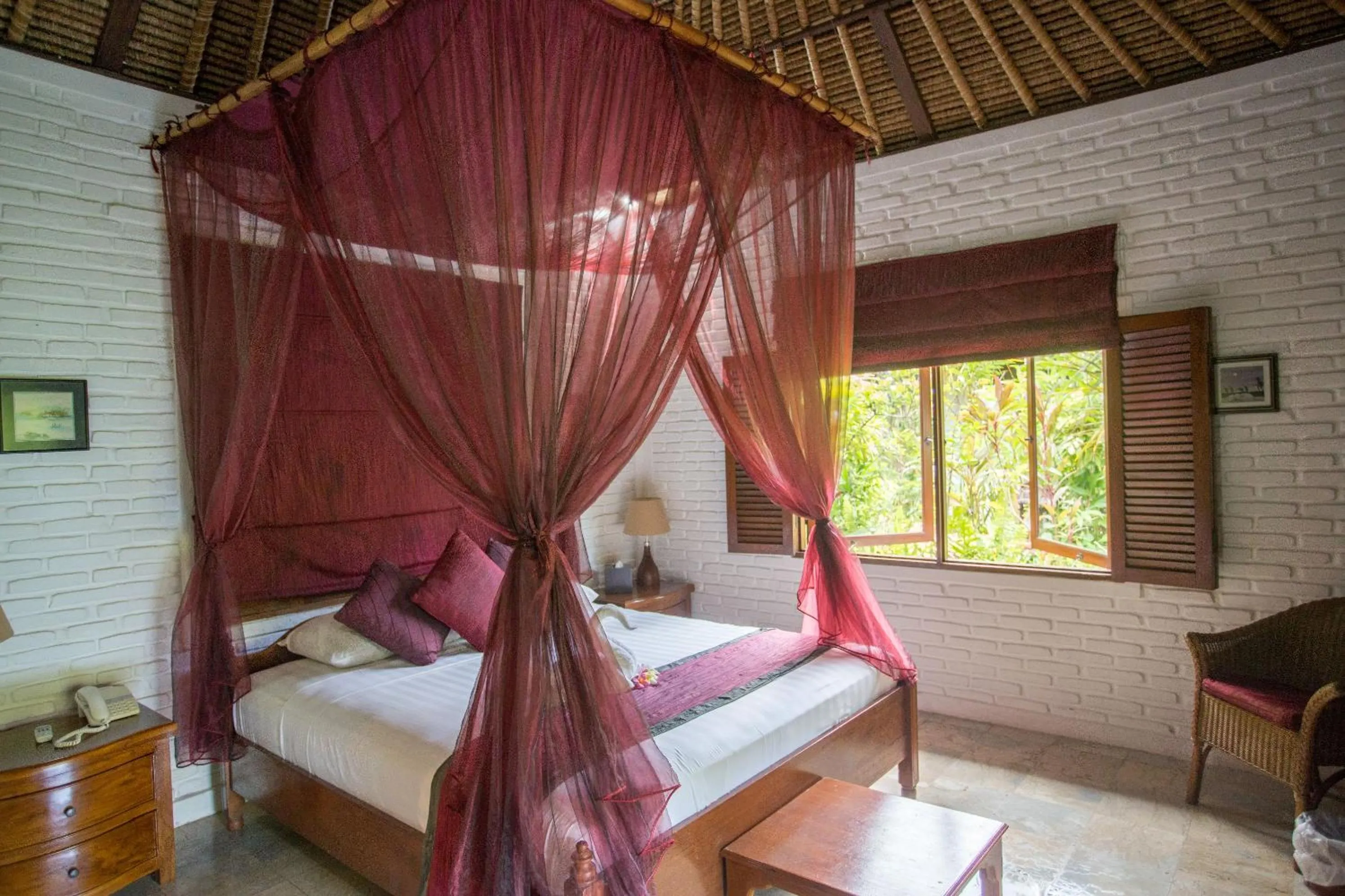 Bed in The Water Garden Hotel