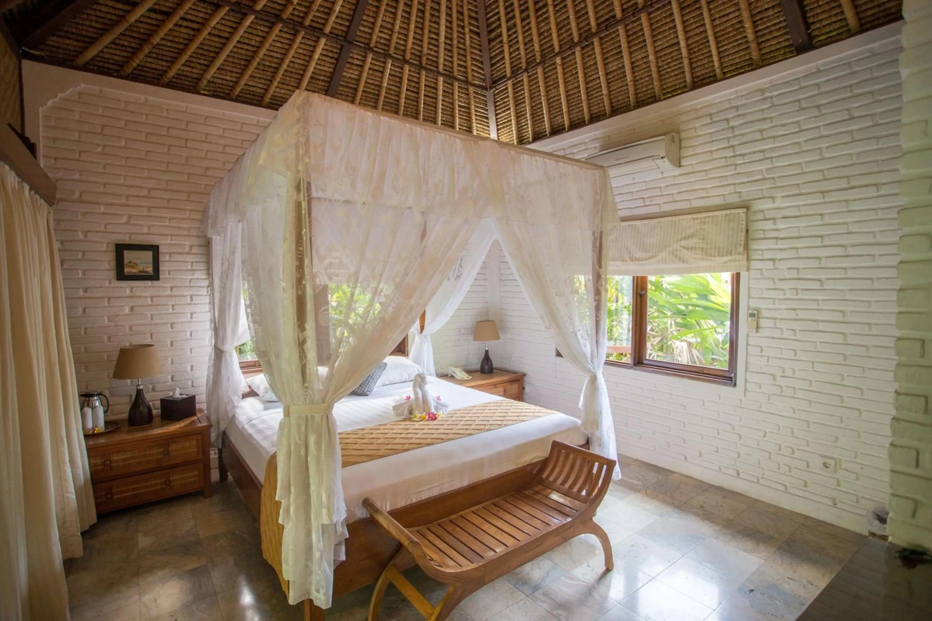 Bed in The Water Garden Hotel