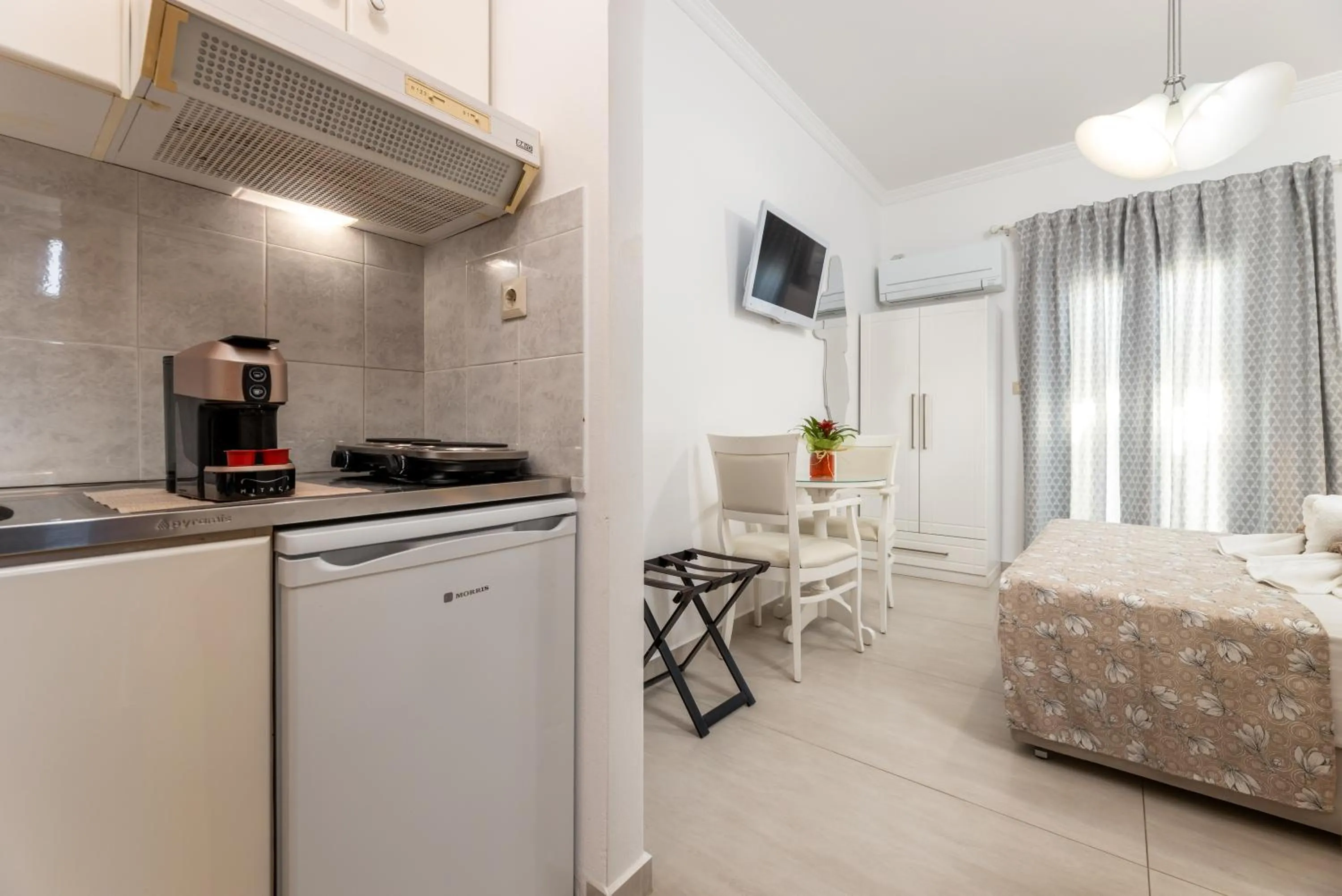 kitchen, Bed in Panos Luxury Studios