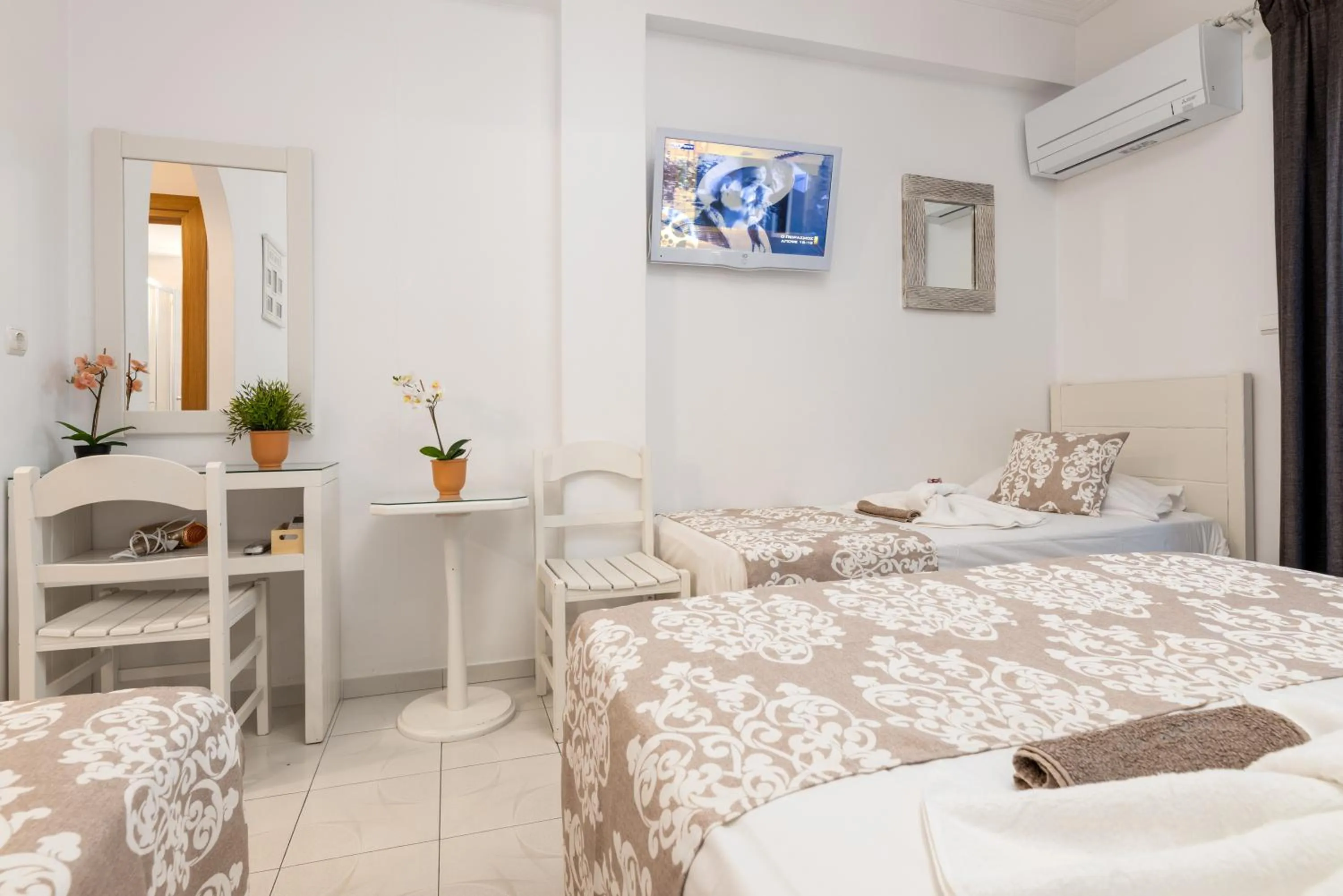 air conditioner, Bed in Panos Luxury Studios