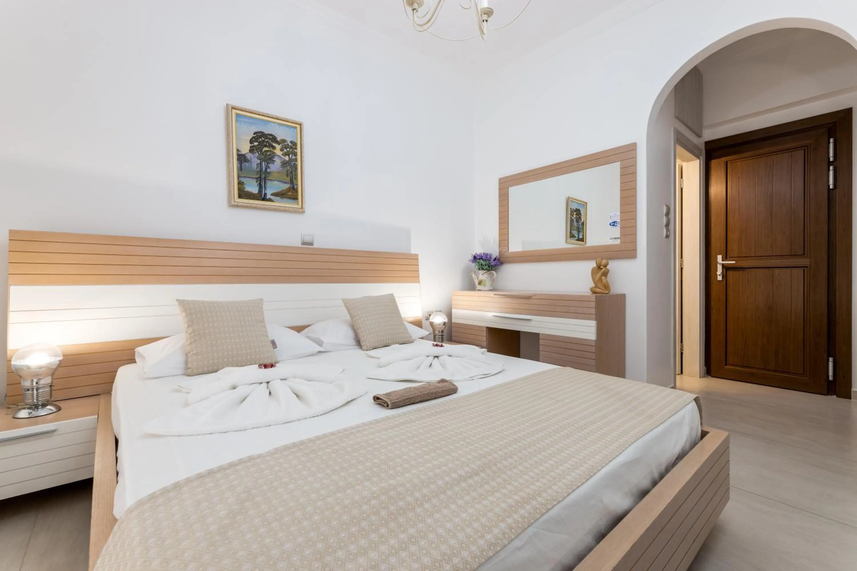 Bed in Panos Luxury Studios