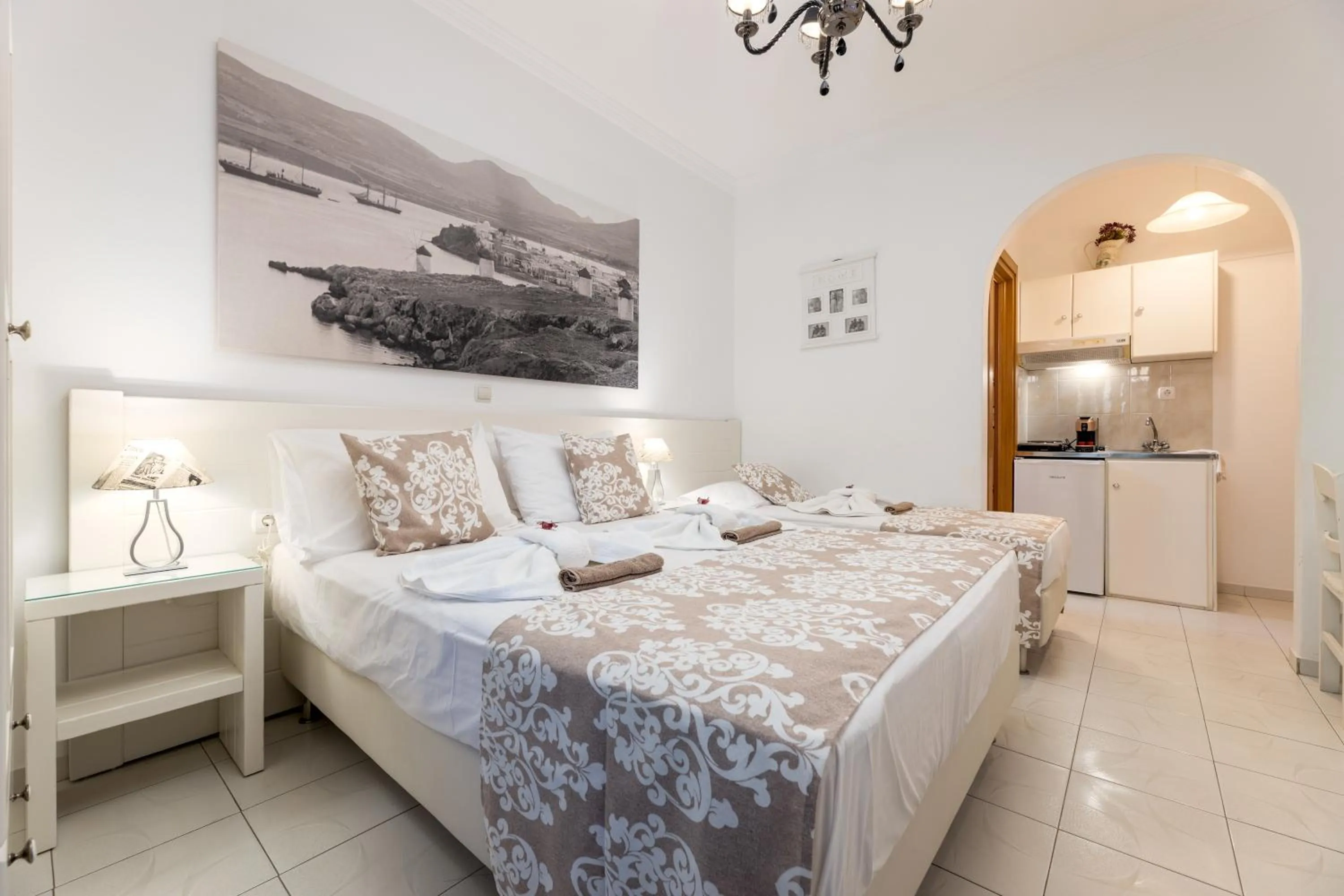 Bed in Panos Luxury Studios