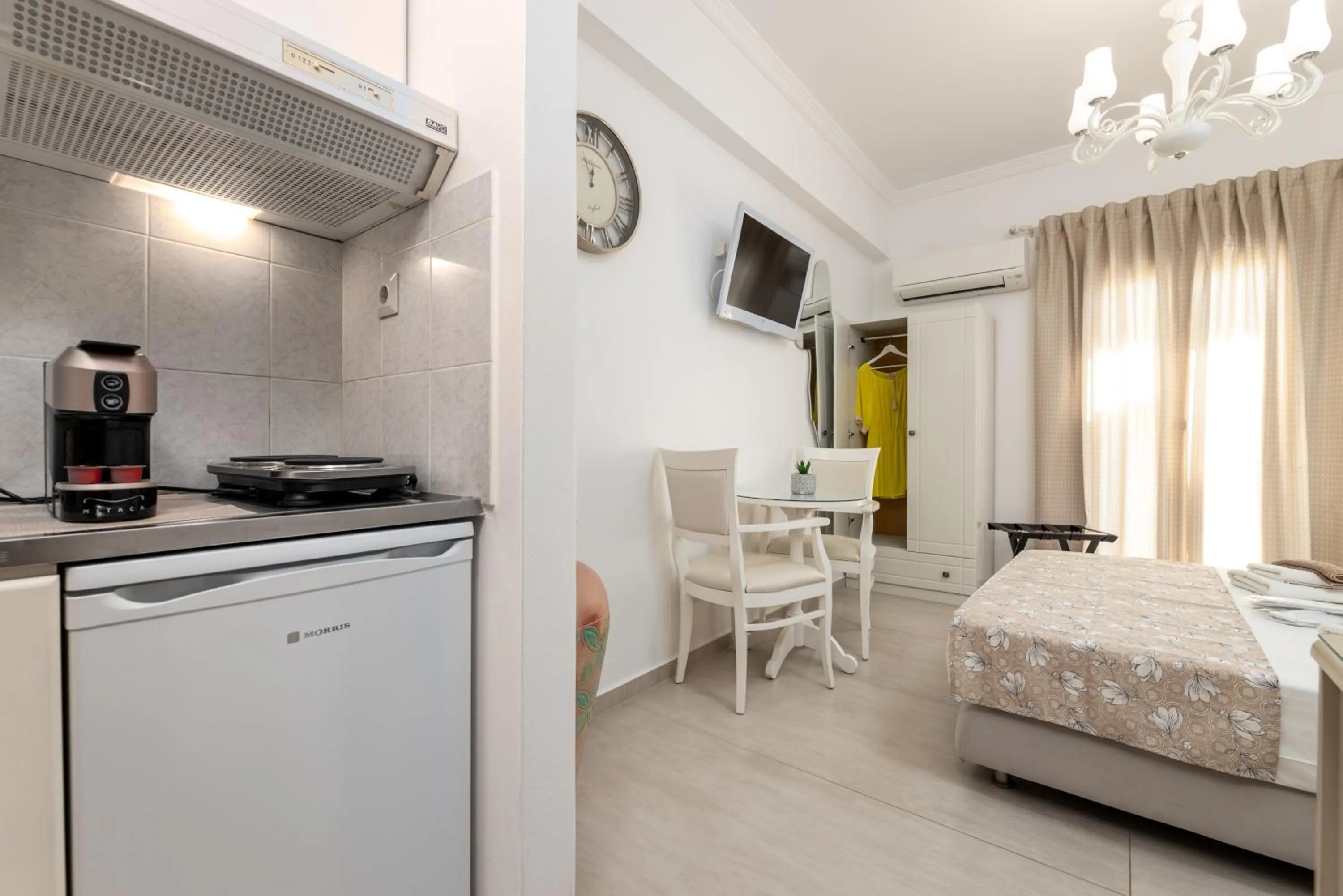 kitchen, Bed in Panos Luxury Studios