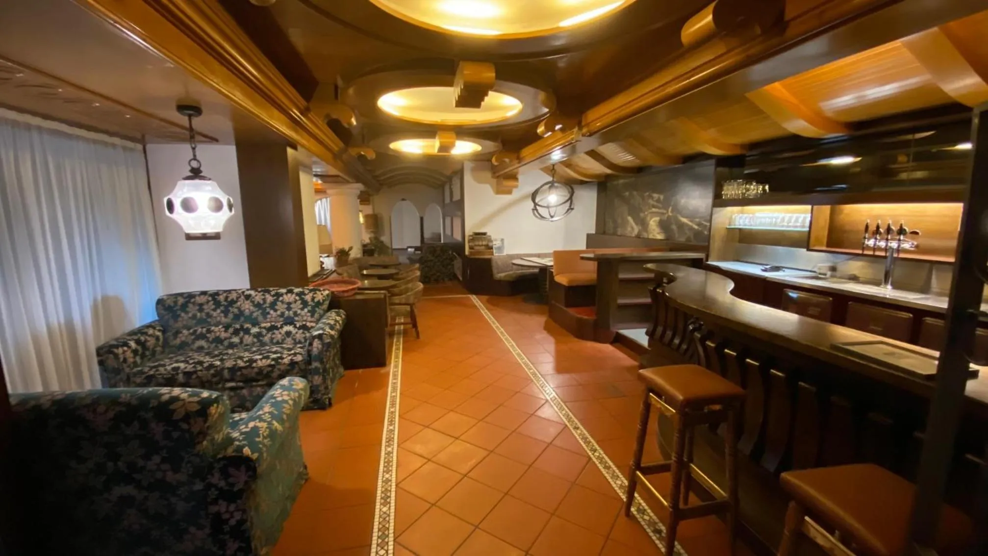 Communal lounge/ TV room in Hotel Regina Delle Dolomiti