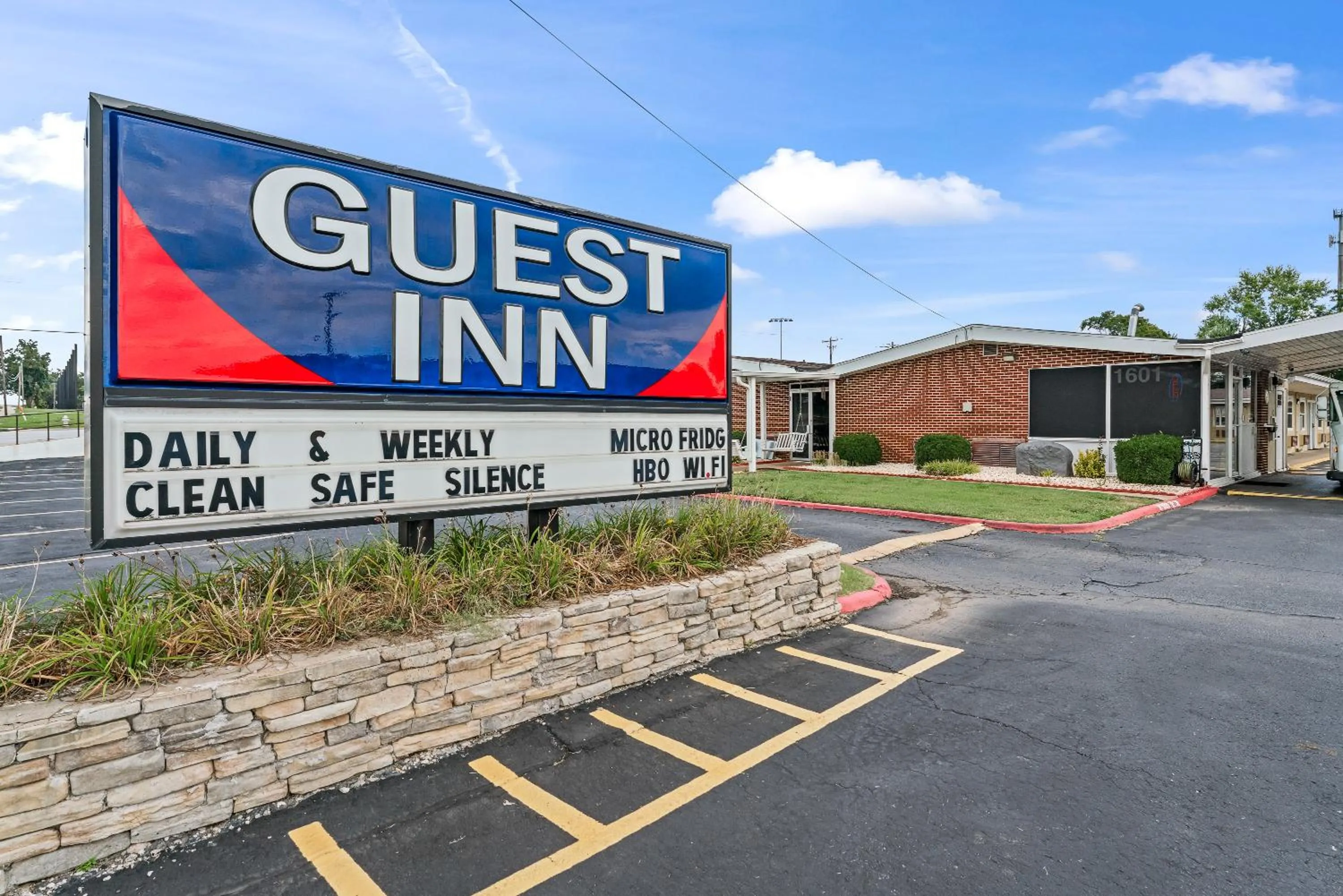 Property logo or sign in Guest Inn Rogers