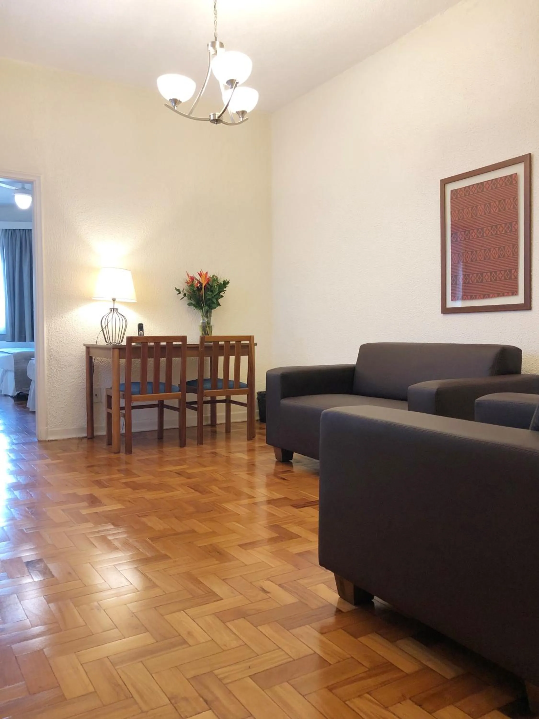 Living room in Hotel Rojas All Suite