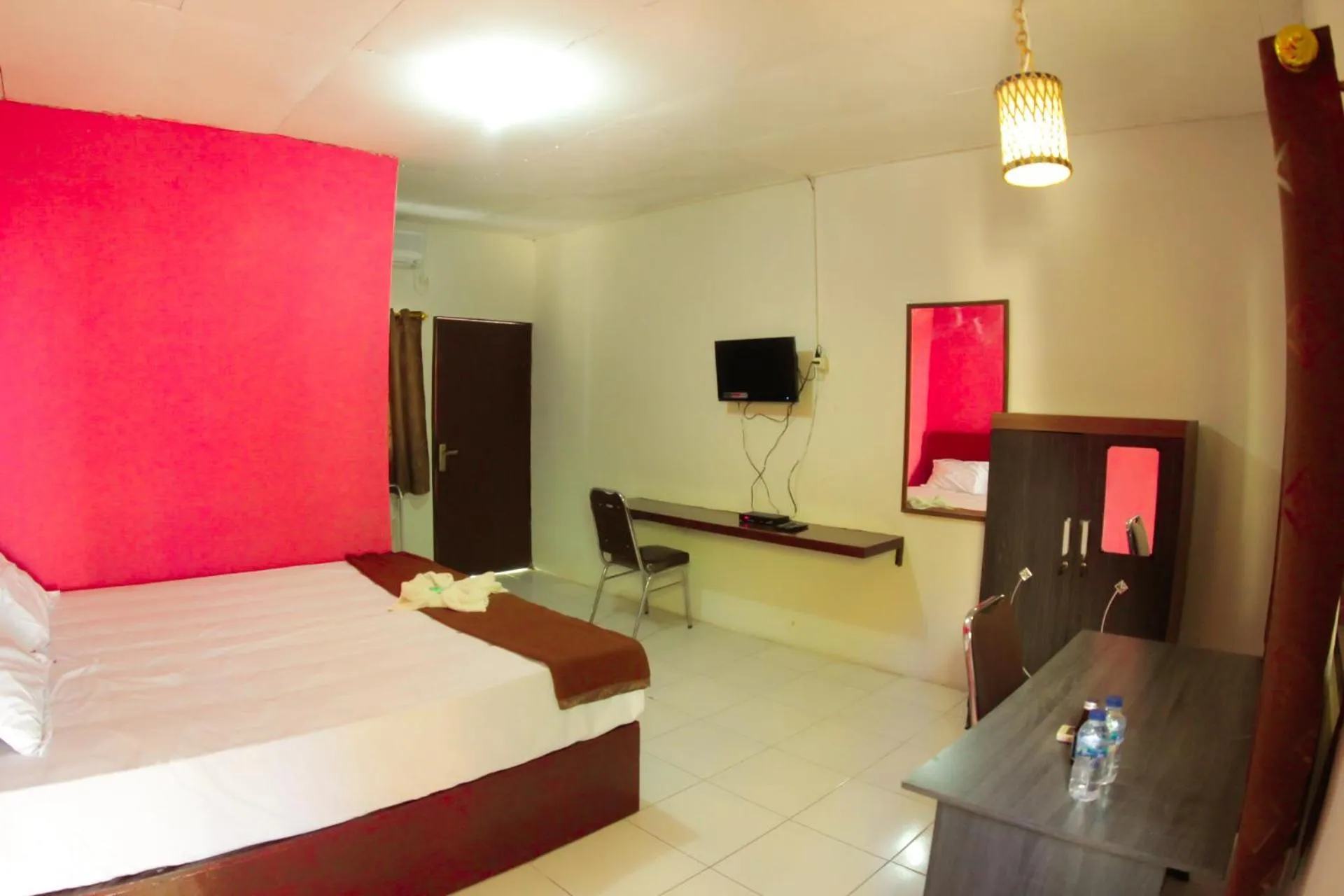 Bedroom in FX72 Beach Resort Maumere