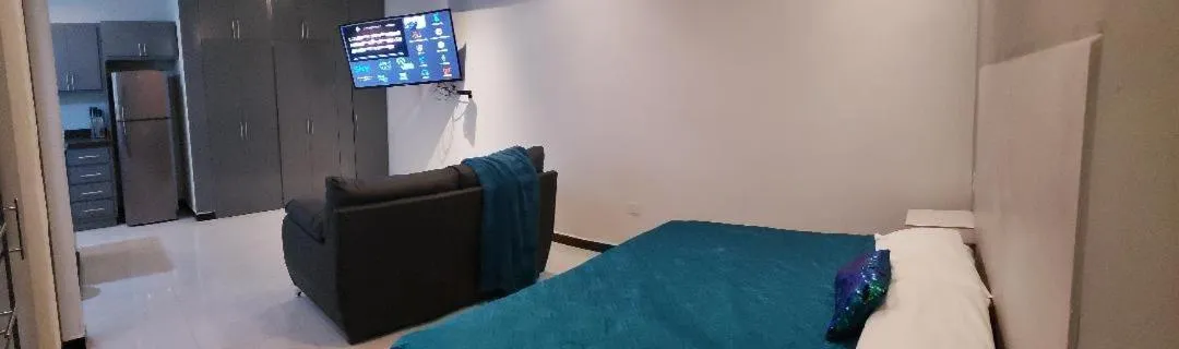 Bed in Privatto Suites