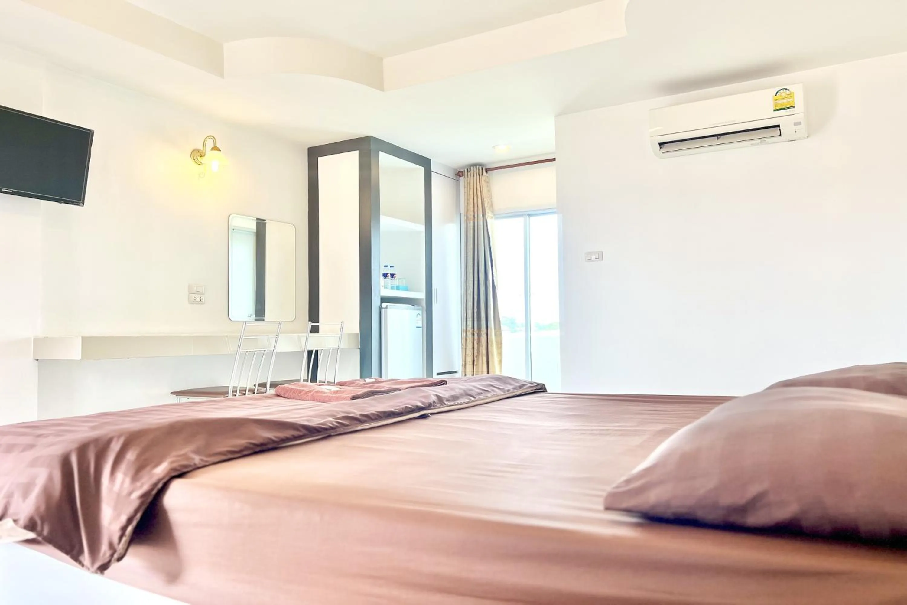 Bed in Grand Place Resort