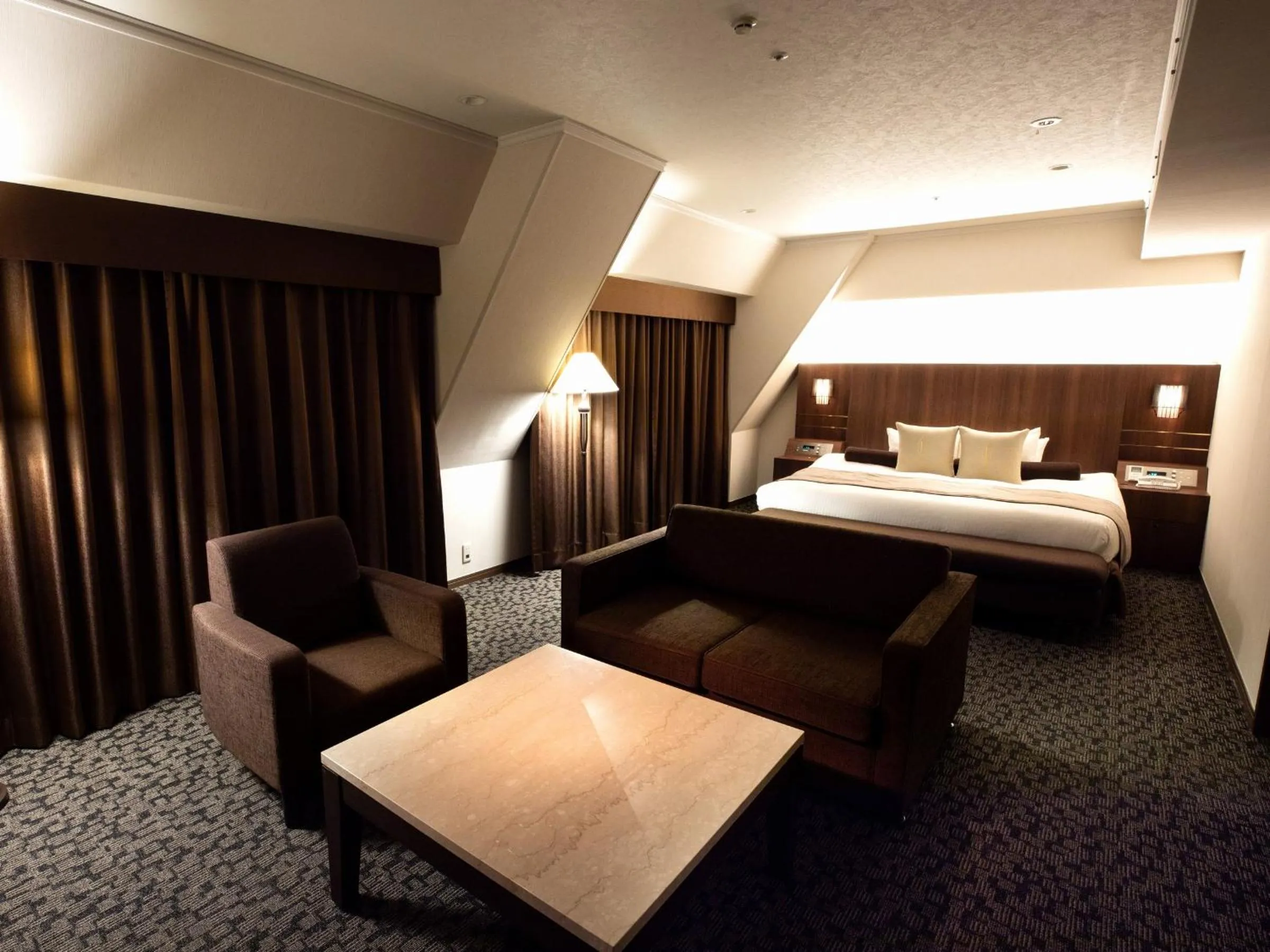 Bed in Hotel Bellclassic Tokyo