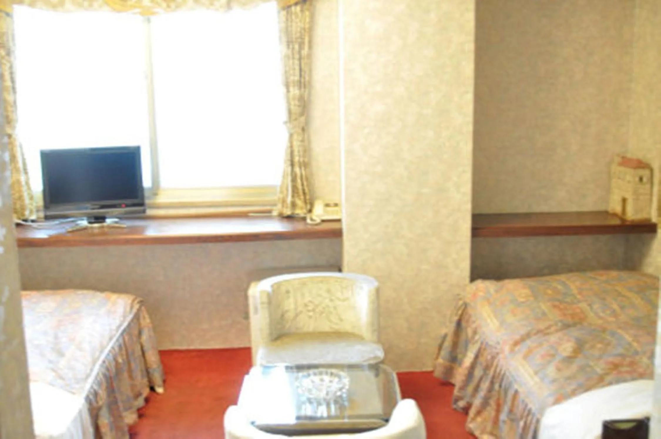 Bed in Green Hotel Rich Tokugawaen