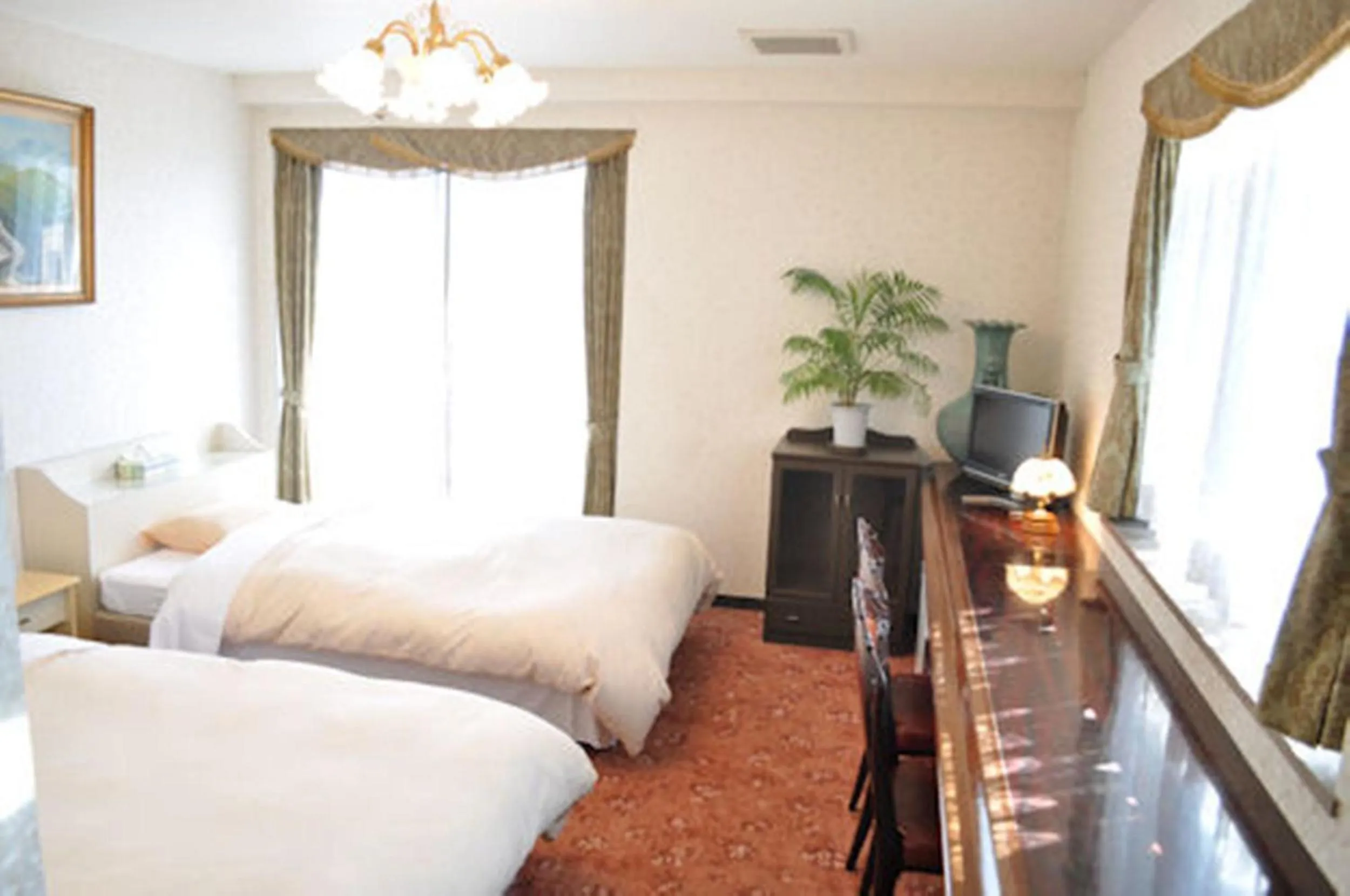 Bed in Green Hotel Rich Tokugawaen