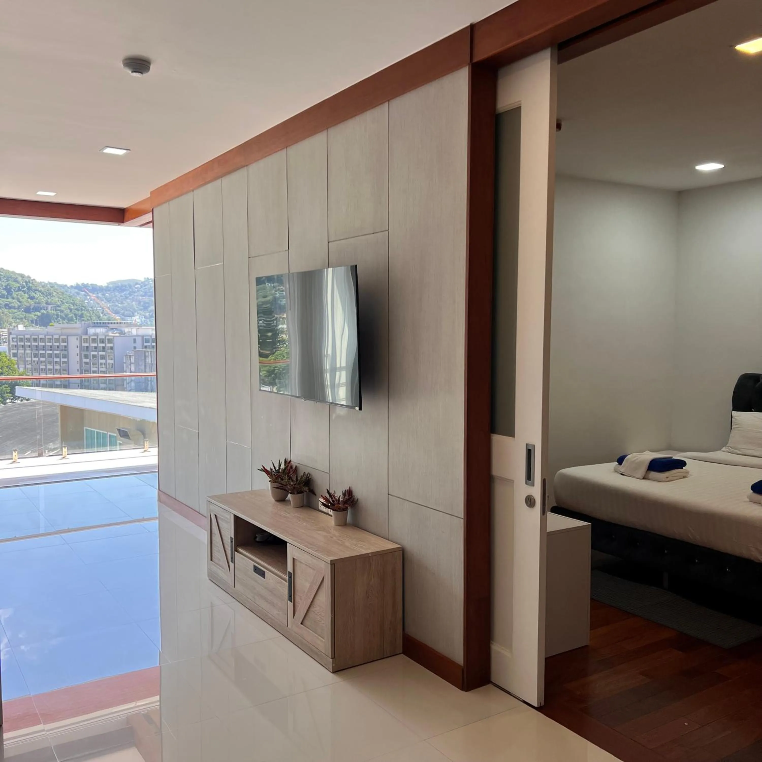 Communal lounge/ TV room in Q Kata Residence