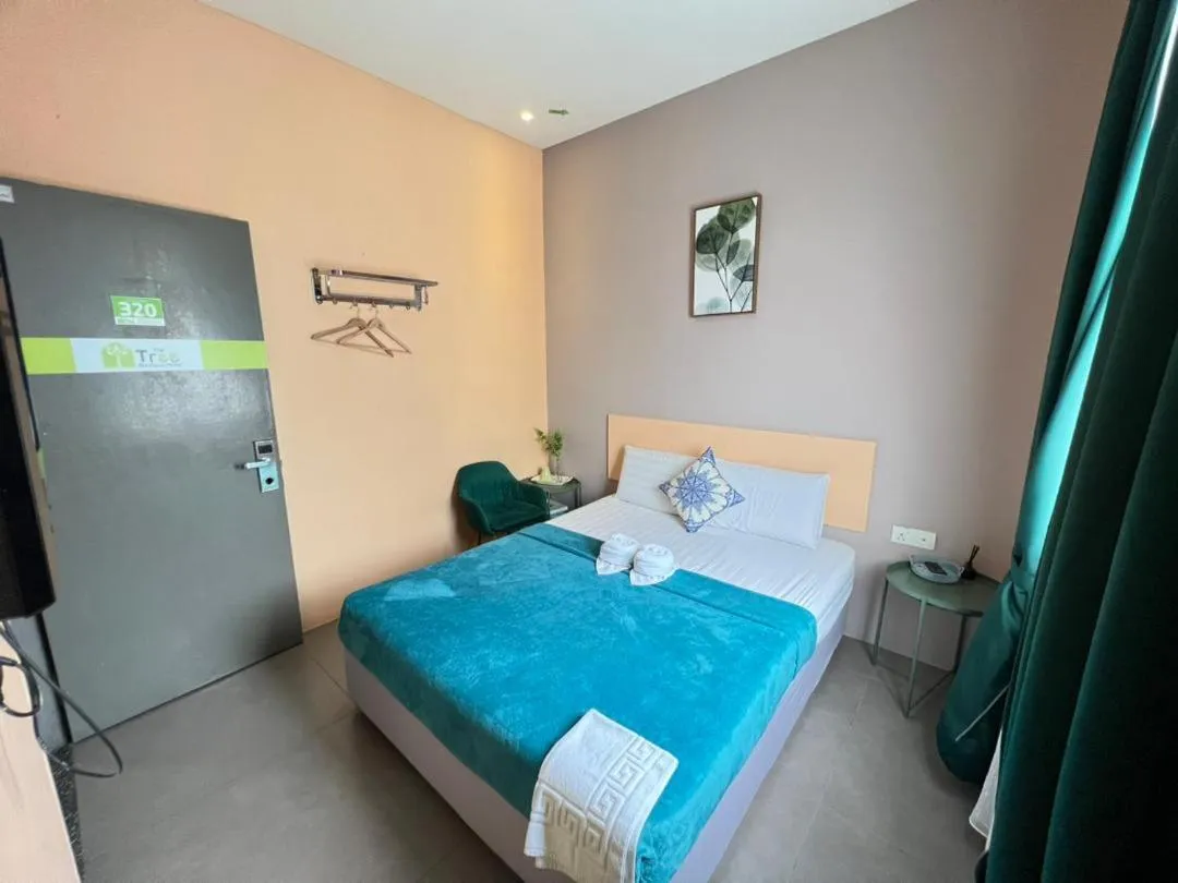 Bed in The Tree Boutique Hotel