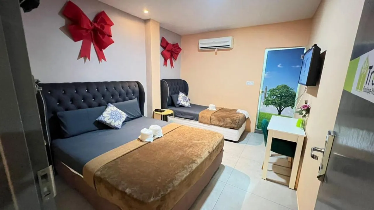 Bed in The Tree Boutique Hotel