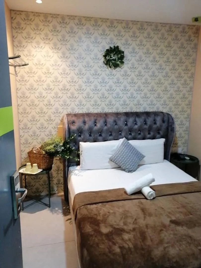 Bed in The Tree Boutique Hotel