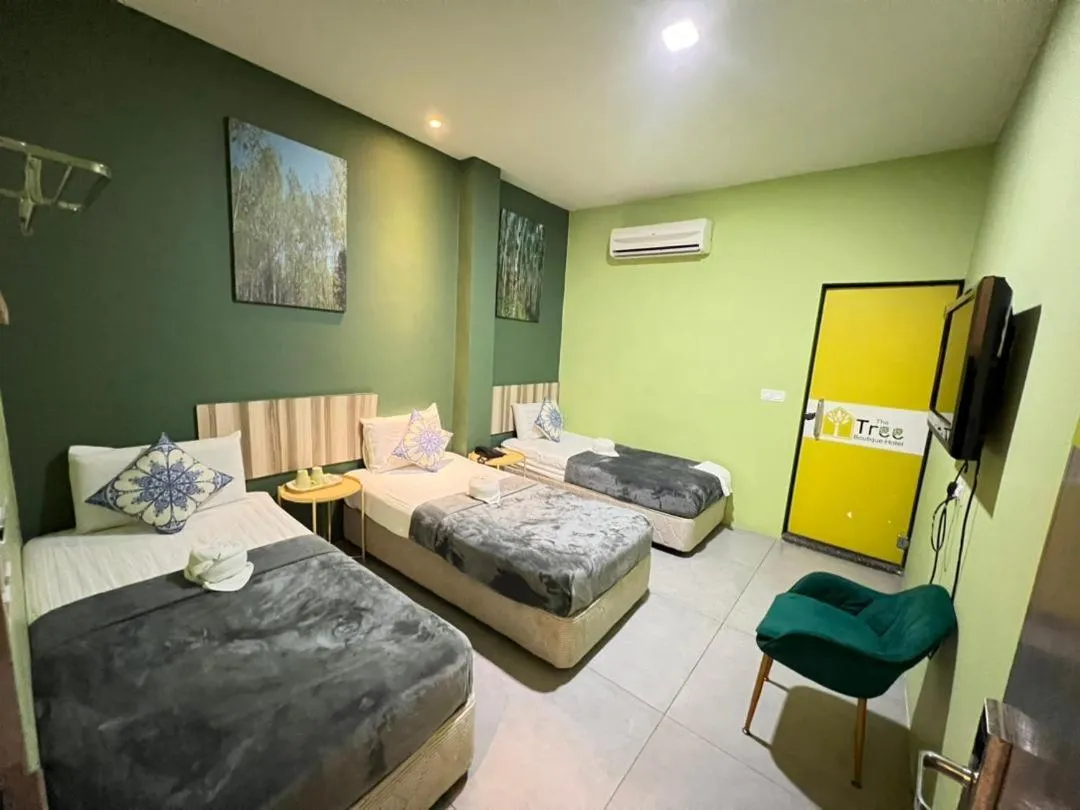 Bed in The Tree Boutique Hotel