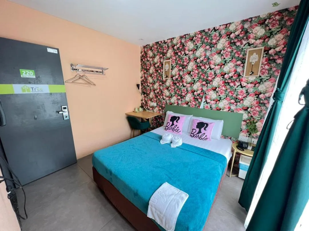 Bed in The Tree Boutique Hotel