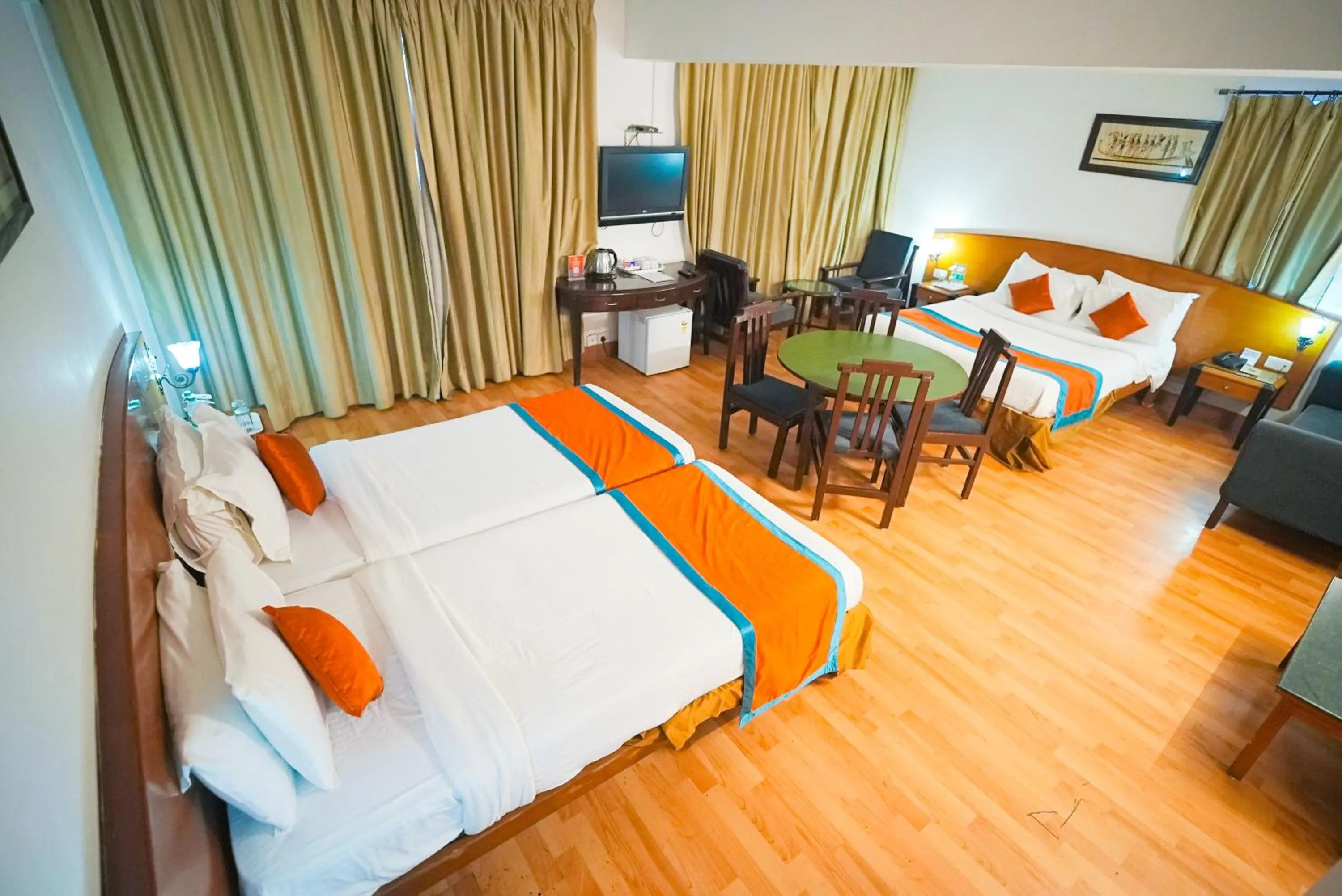 Bed in Ramee Guestline Tirupati