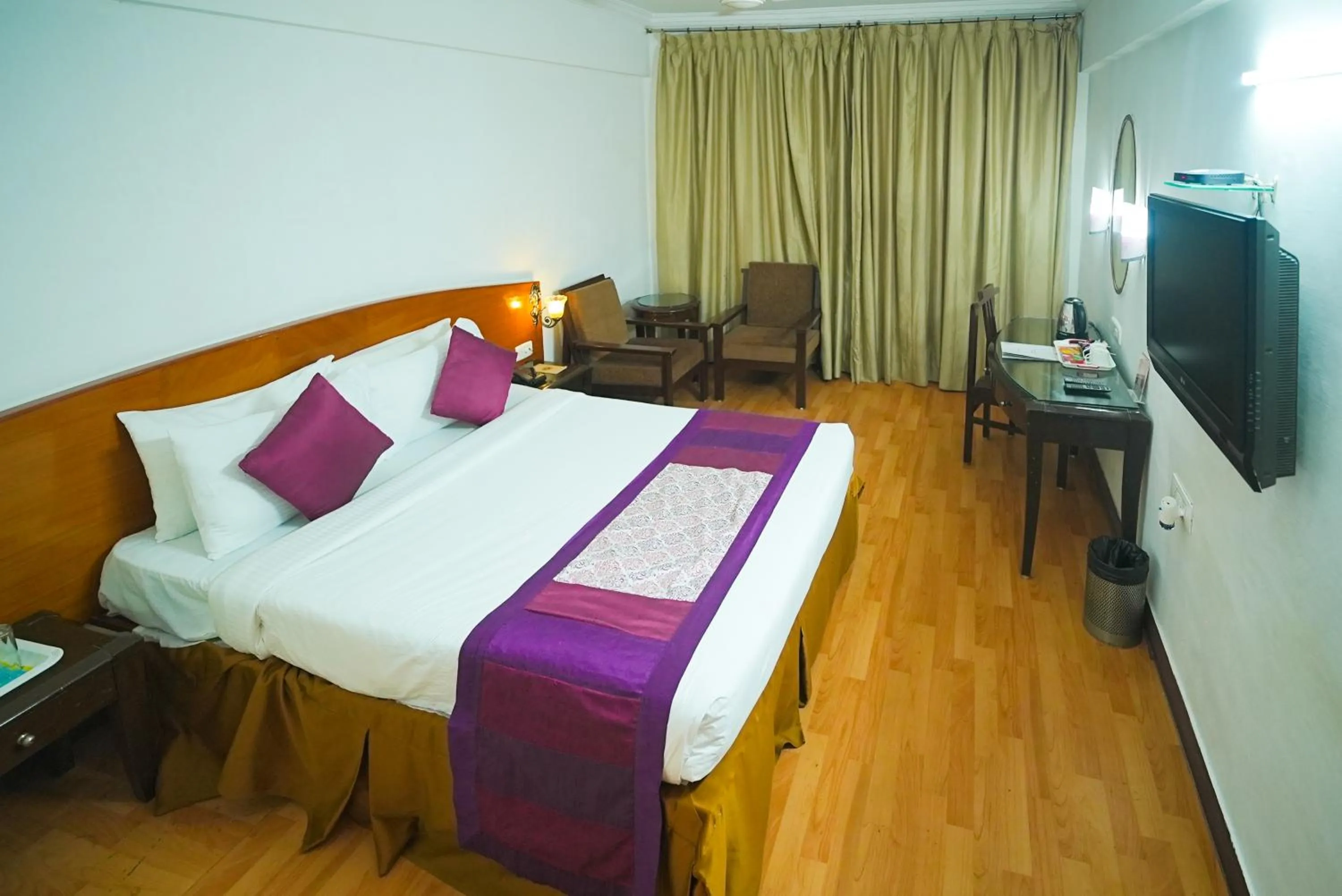 Bedroom, Bed in Ramee Guestline Tirupati