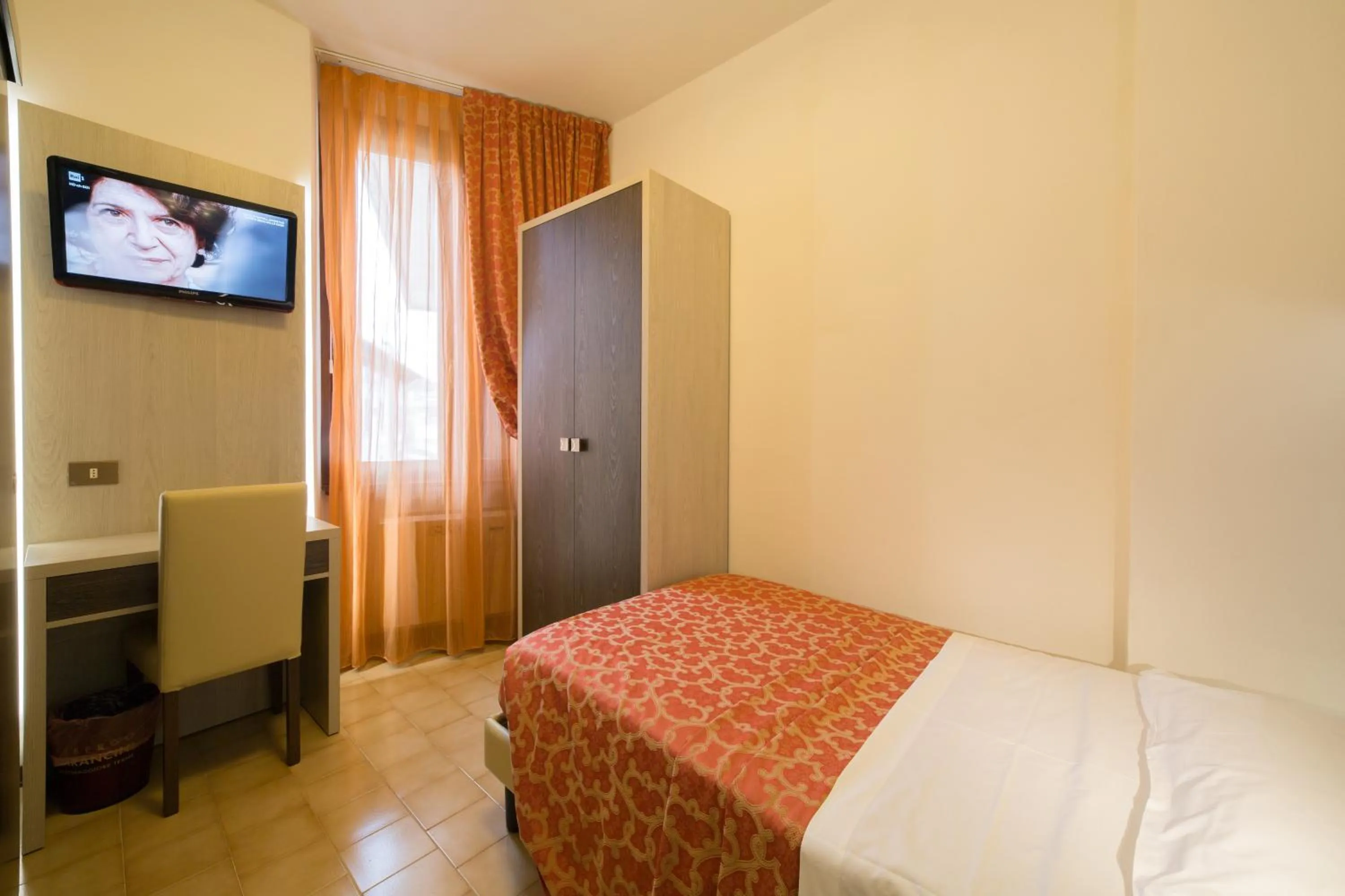 Bed in Hotel Carancini