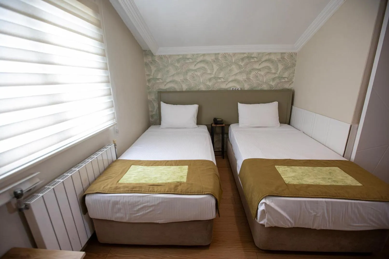 Bed in Hotel Simsek