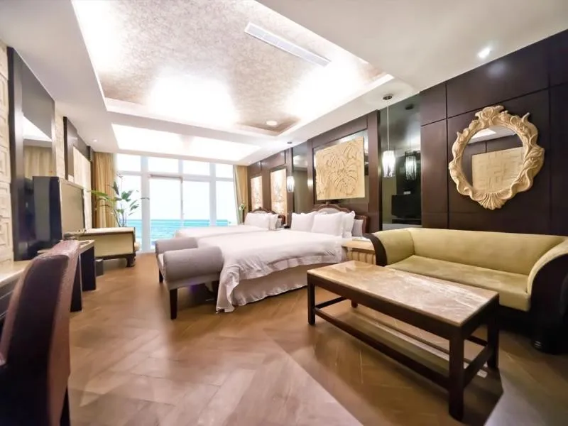 Bed in White House Hot Spring Beach Resort
