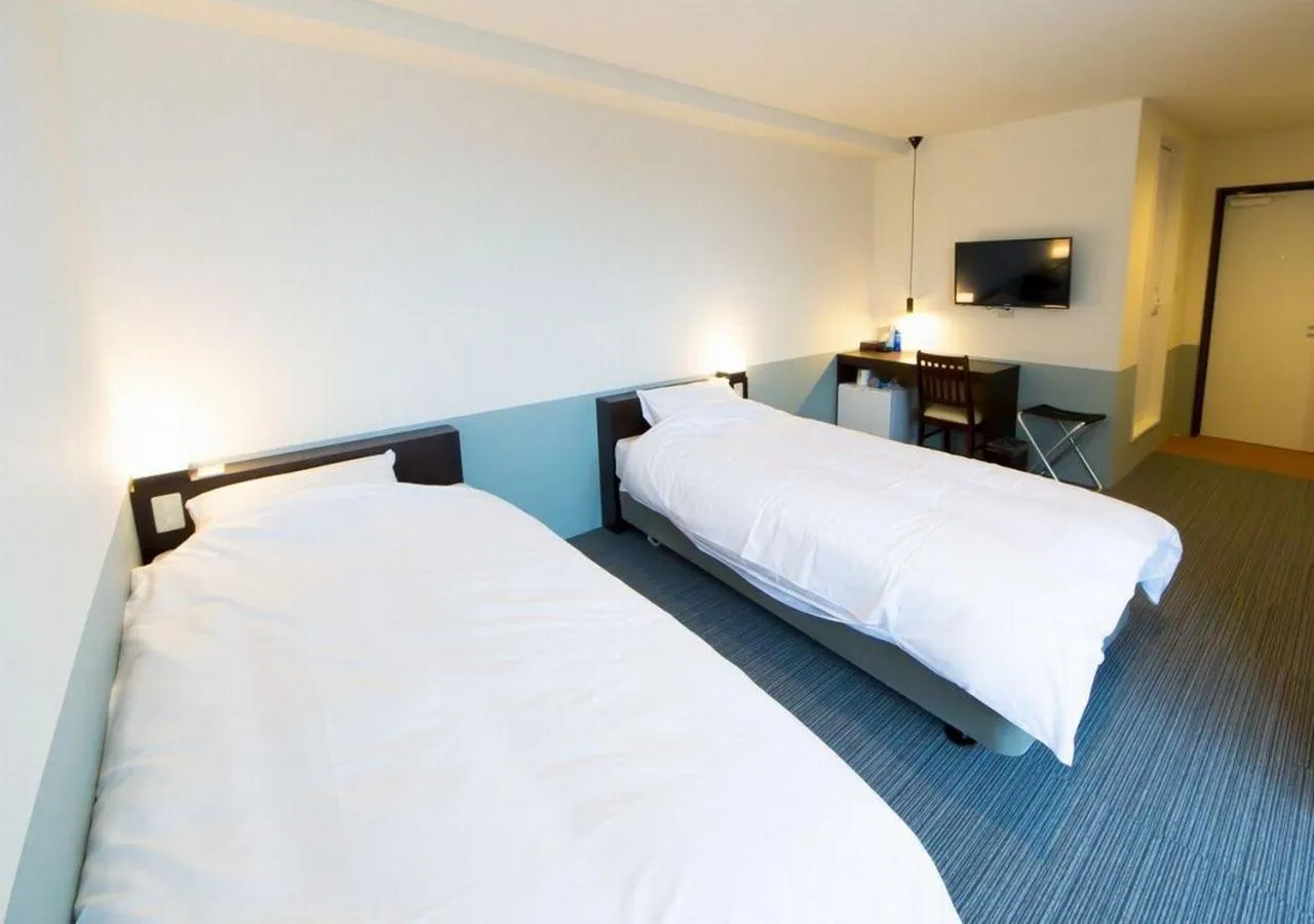 Bed in Hotel Taiyo Nouen Furumitsu