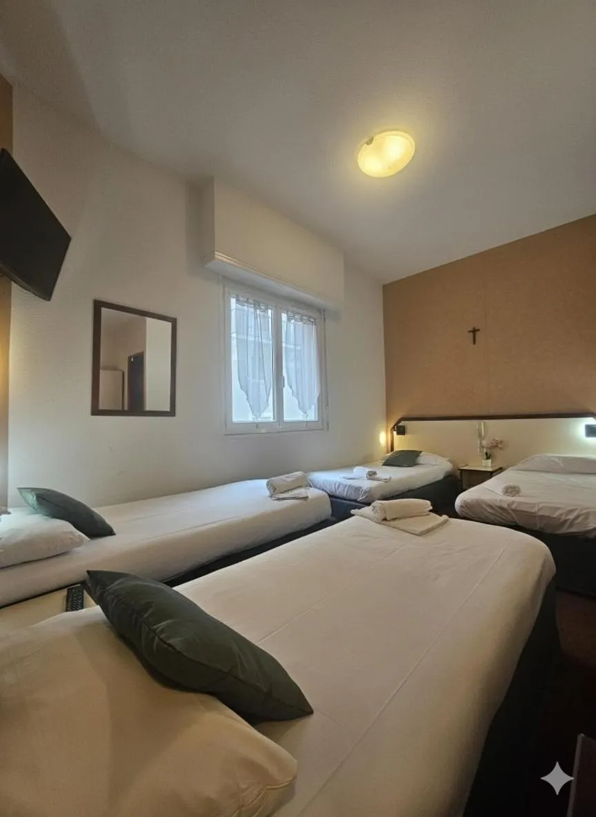 Photo of the whole room, Bed in Hôtel Myosotis