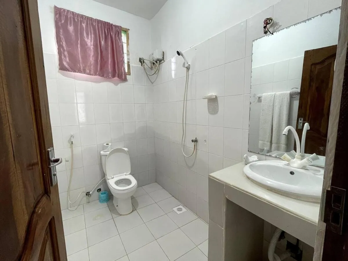 Bathroom in Coconut Tree Village Beach Resort