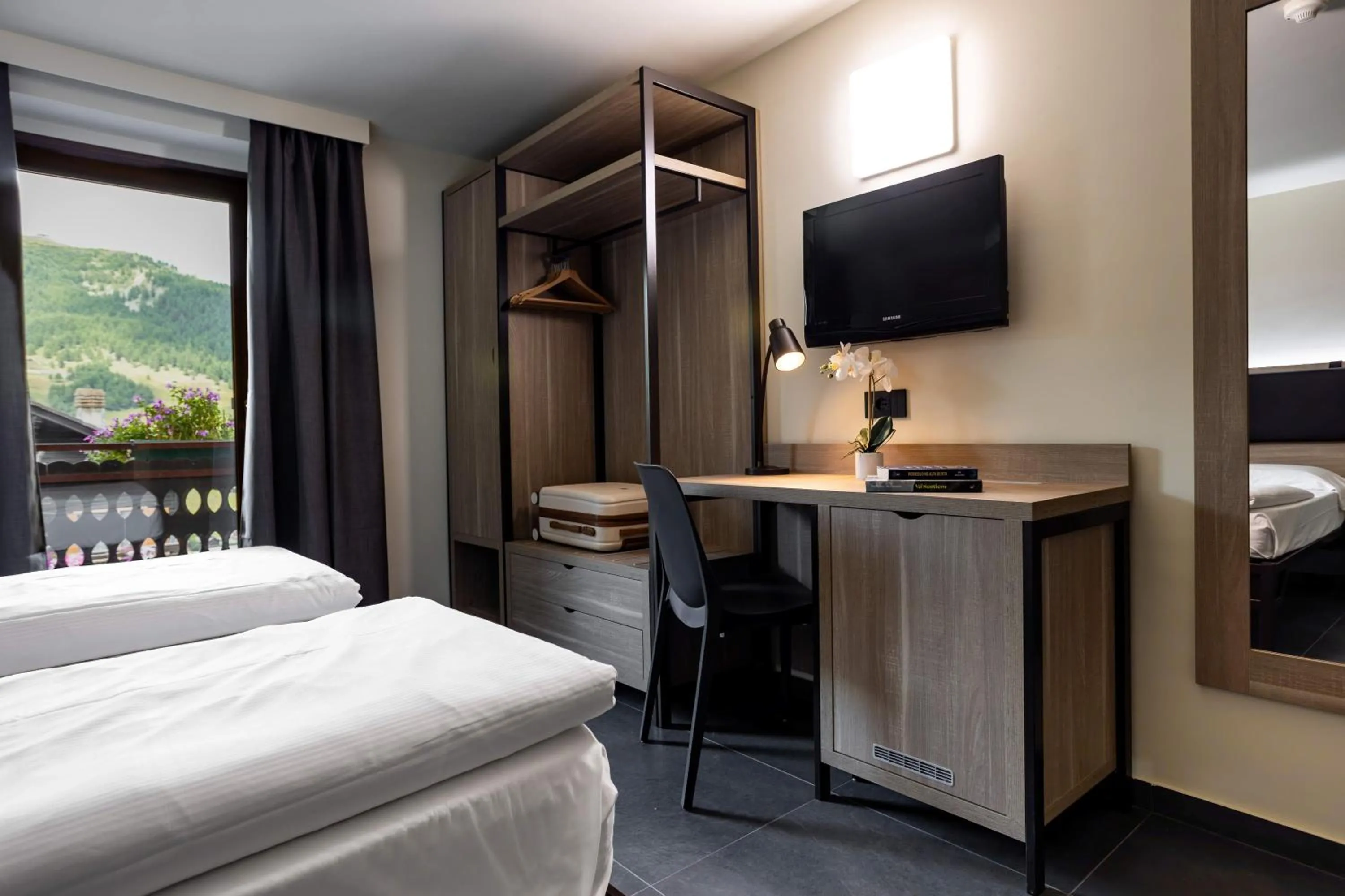 TV and multimedia, Bed in Hotel Loredana