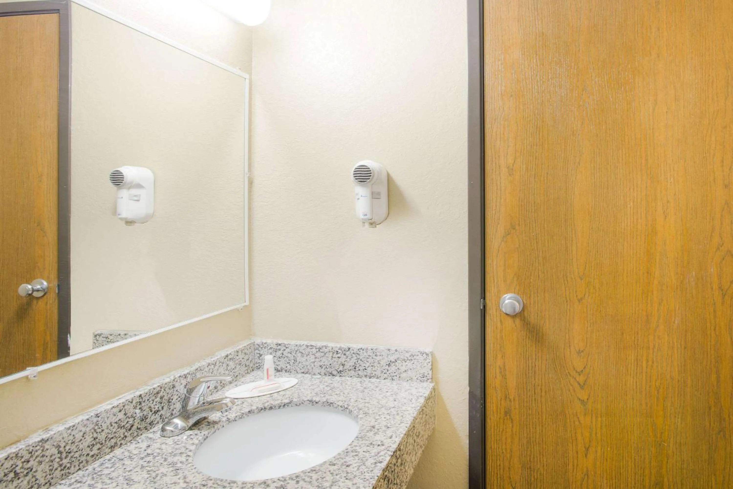 Bathroom in Super 8 by Wyndham Massena NY