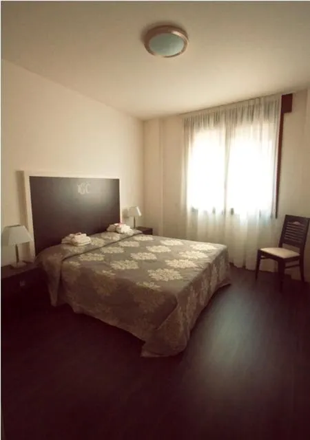 Bed in Hotel Giulio Cesare