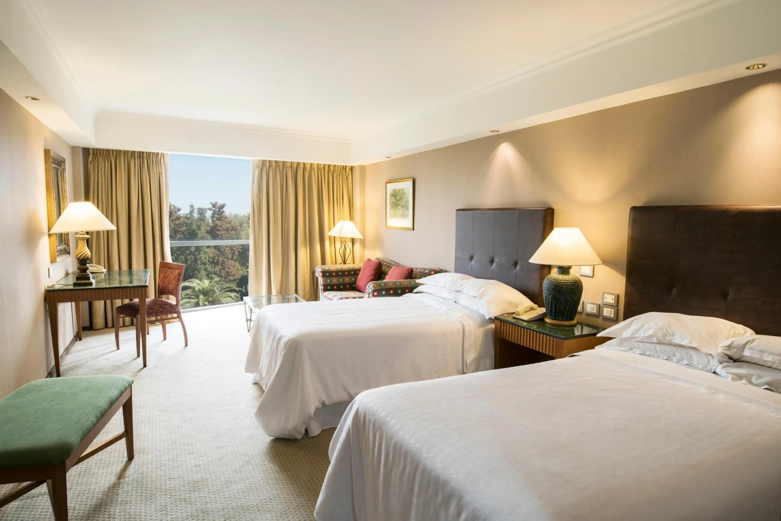 Photo of the whole room, Bed in Sheraton Pilar Hotel & Convention Center