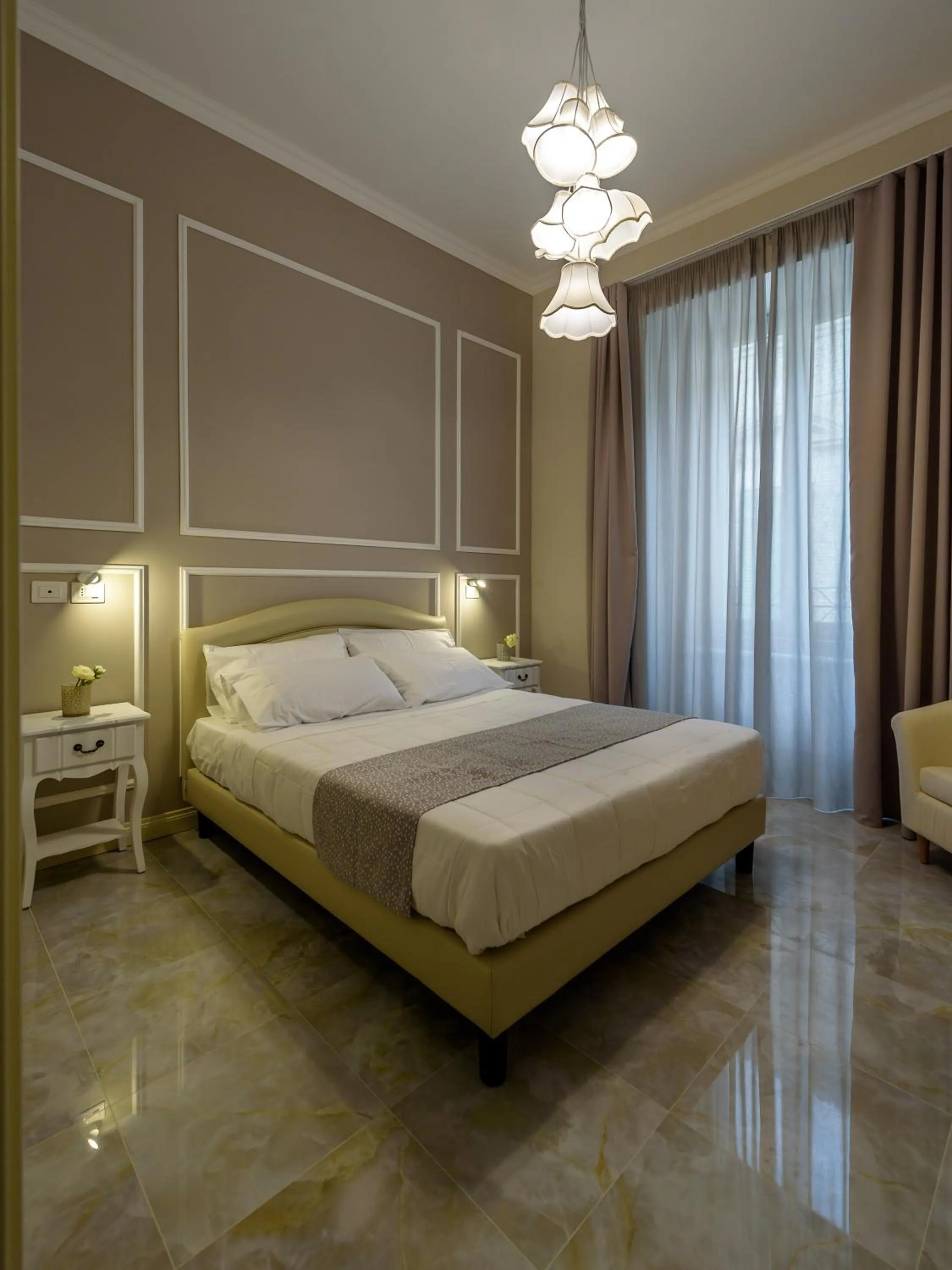 Bed in Marie Claire Apartments & Spa