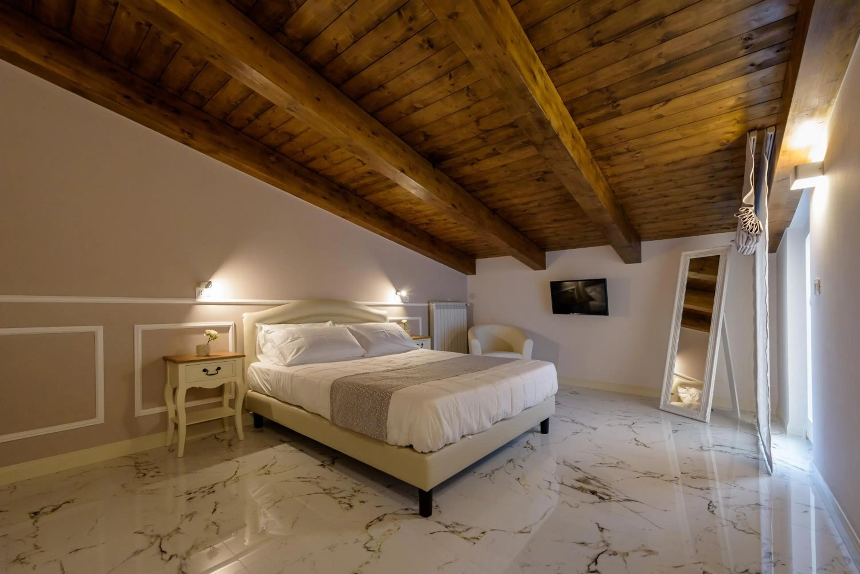 Bed in Marie Claire Apartments & Spa