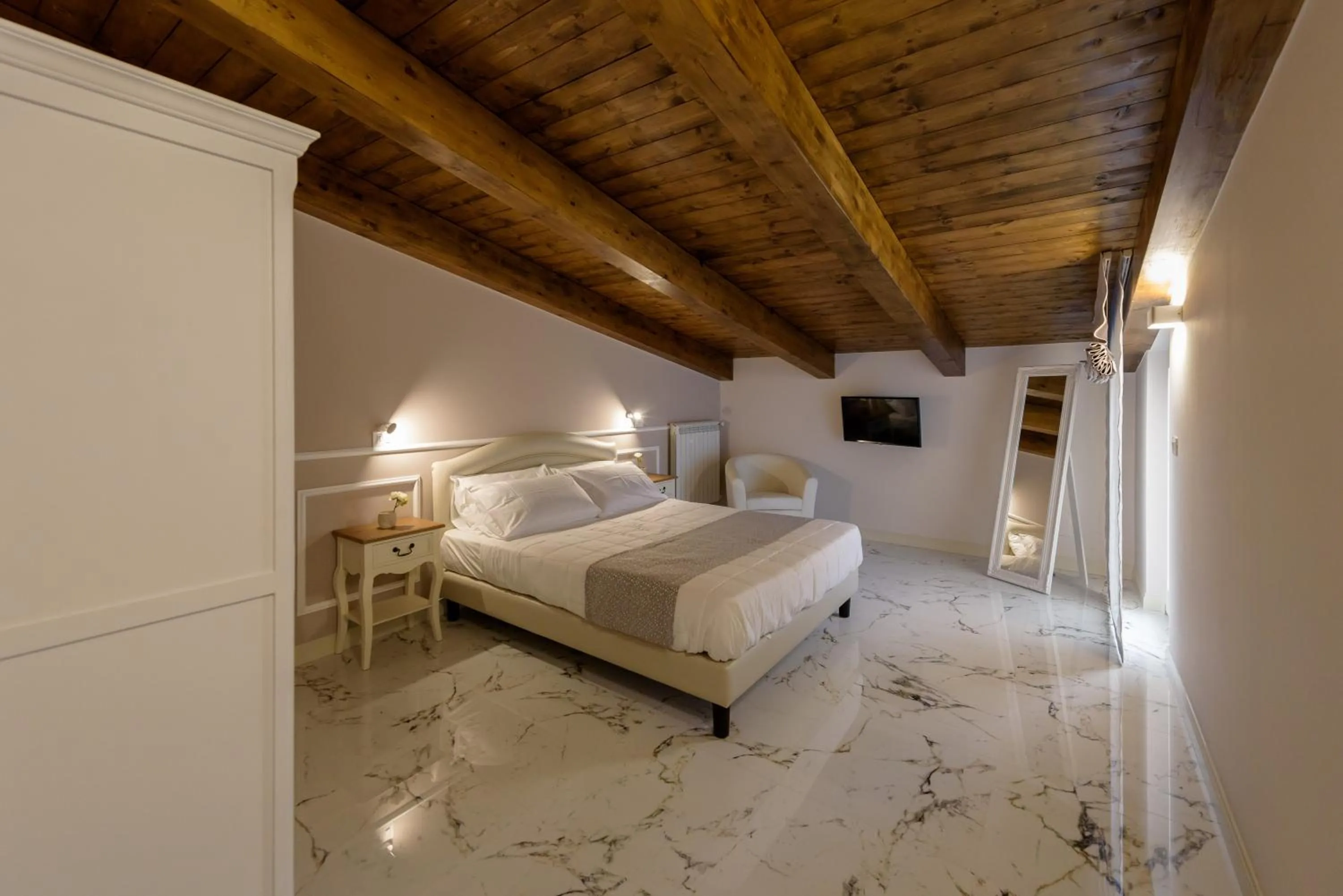 Bed in Marie Claire Apartments & Spa